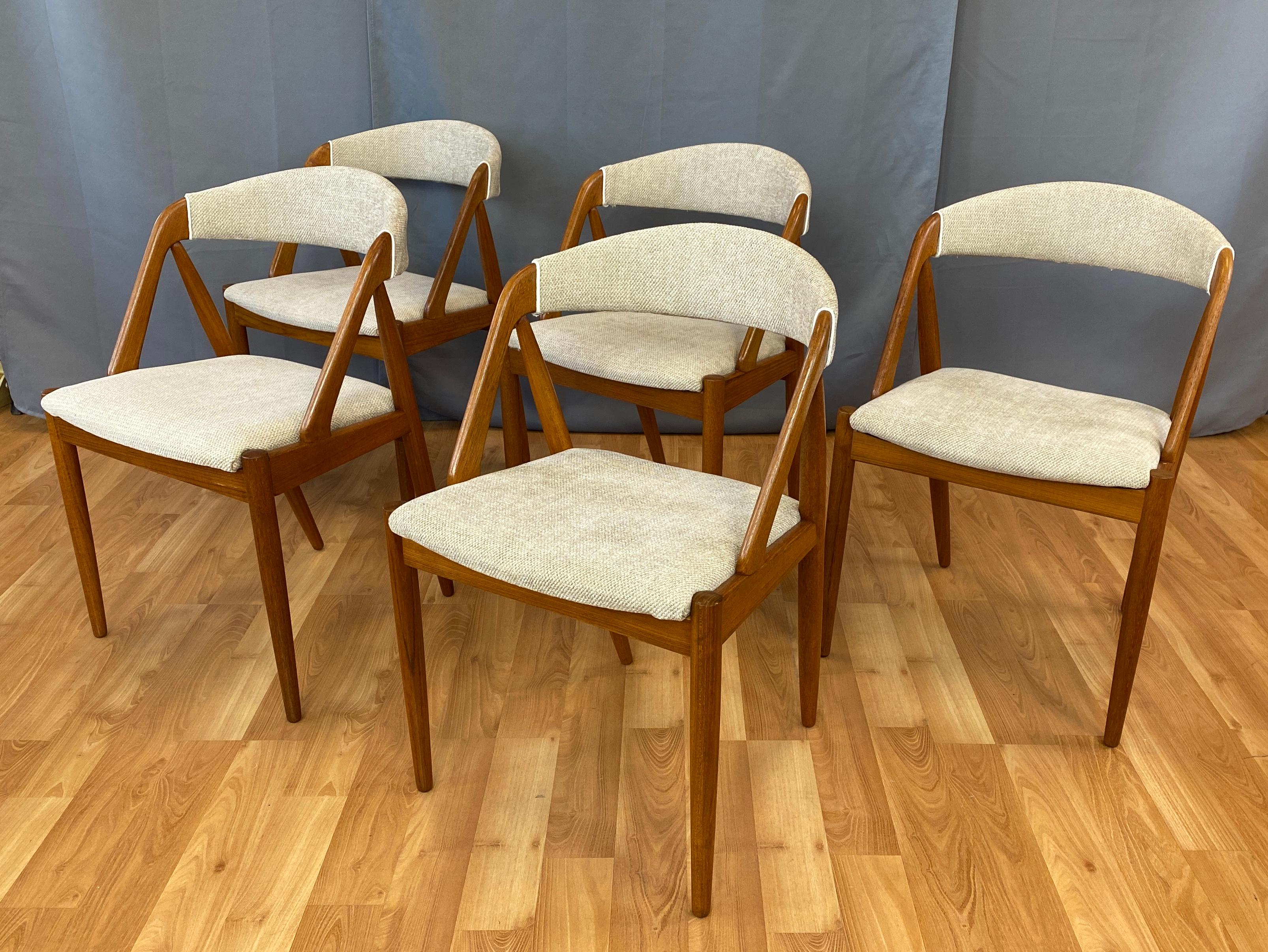 Offered here is a set of five Kai Kristiansen designed Model 31 Teak dining chairs, and made 
by Schou Andersen Møbelfabrik (label underside) 

Sculptural Teak frames, a mix of straight and curved lines giving you it's classic look. 
Very