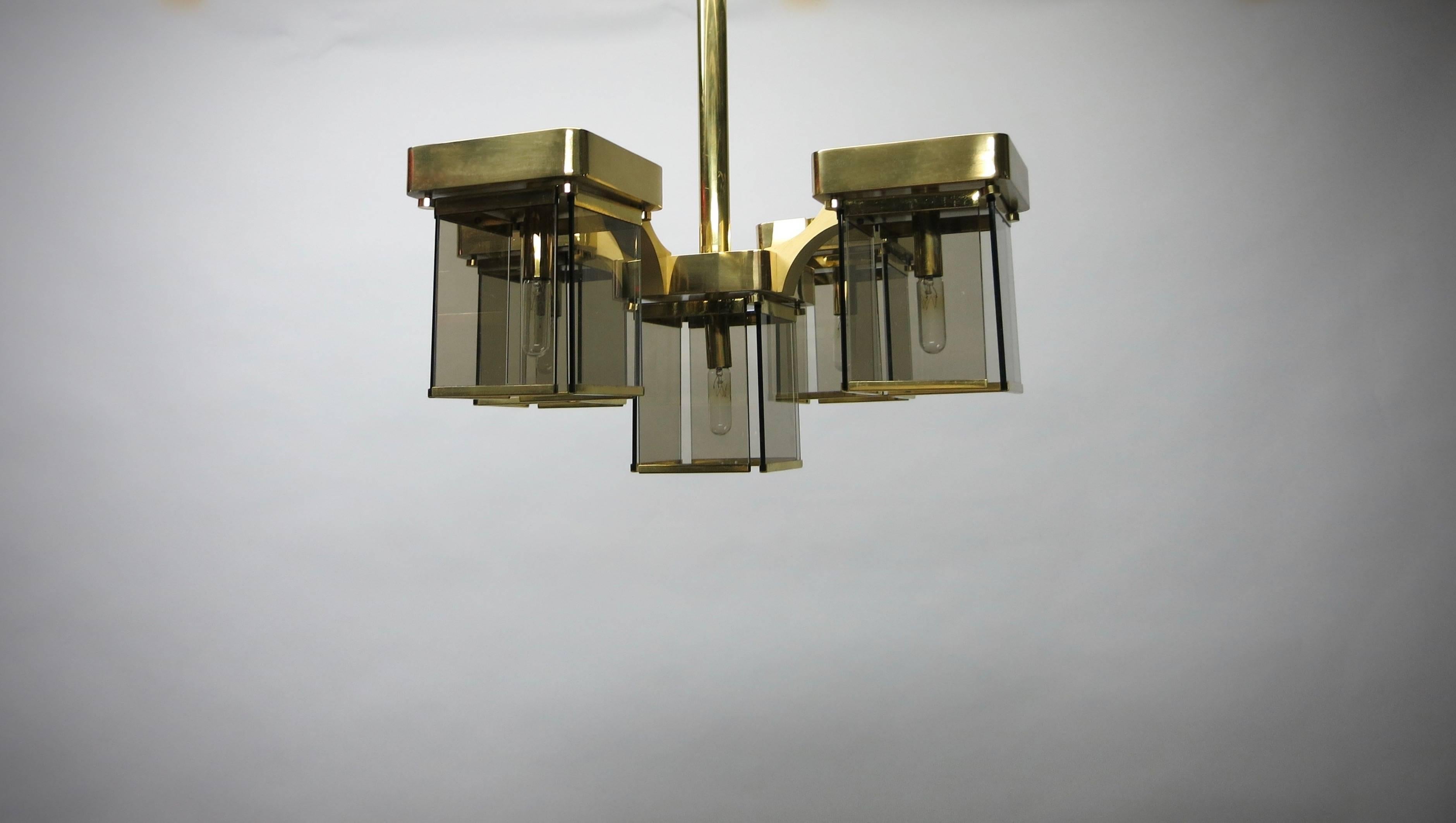 Sciolari ceiling fixture has five lights and comprises panels of bronze smoked glass and brass plated hardware. Final height drop can be customized, measurements provided are of the fixture's overall size from the top of the lights to the bottom