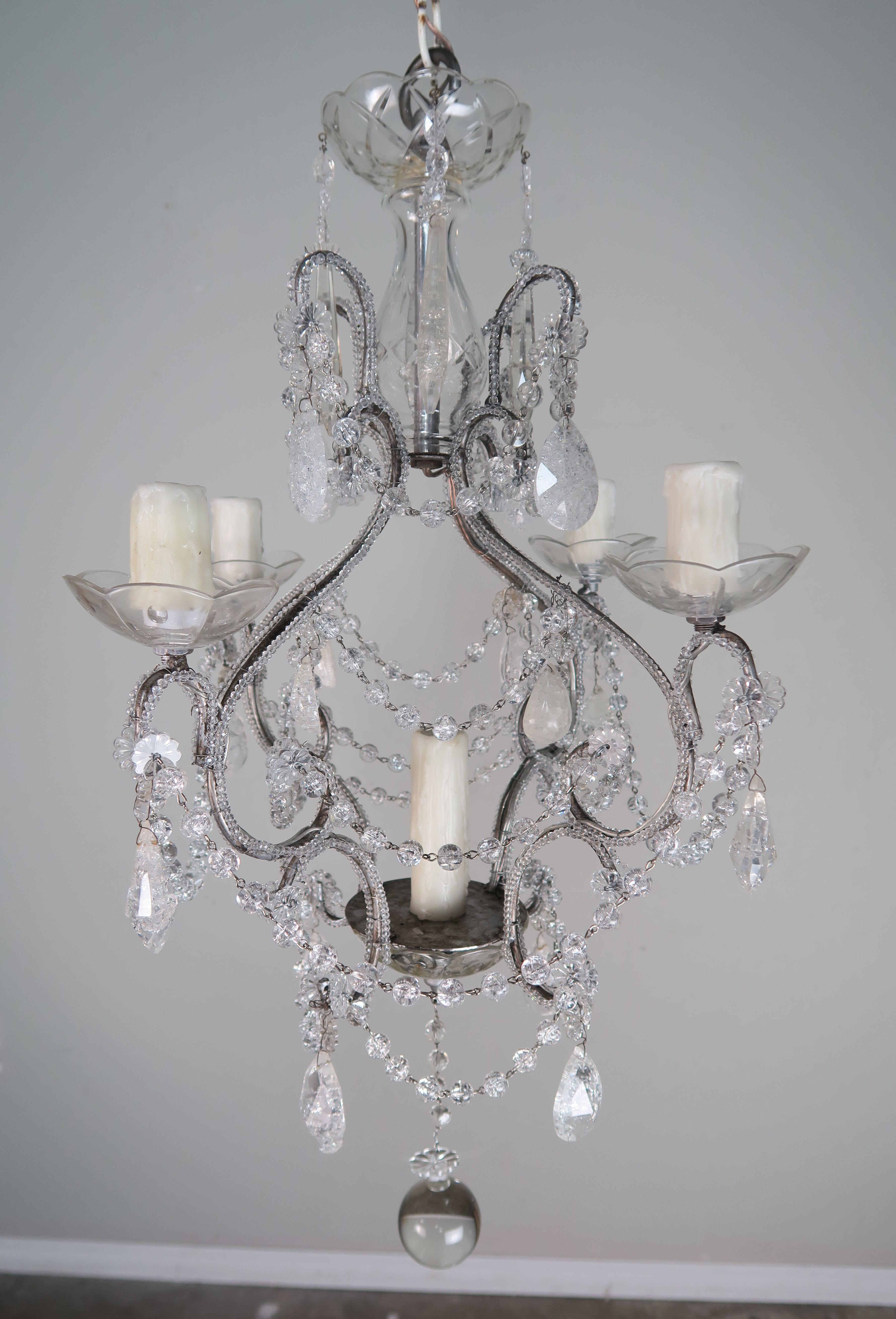 Five-light French rock crystal beaded chandelier that has been newly rewired with drip wax candle covers. Includes chain and canopy.