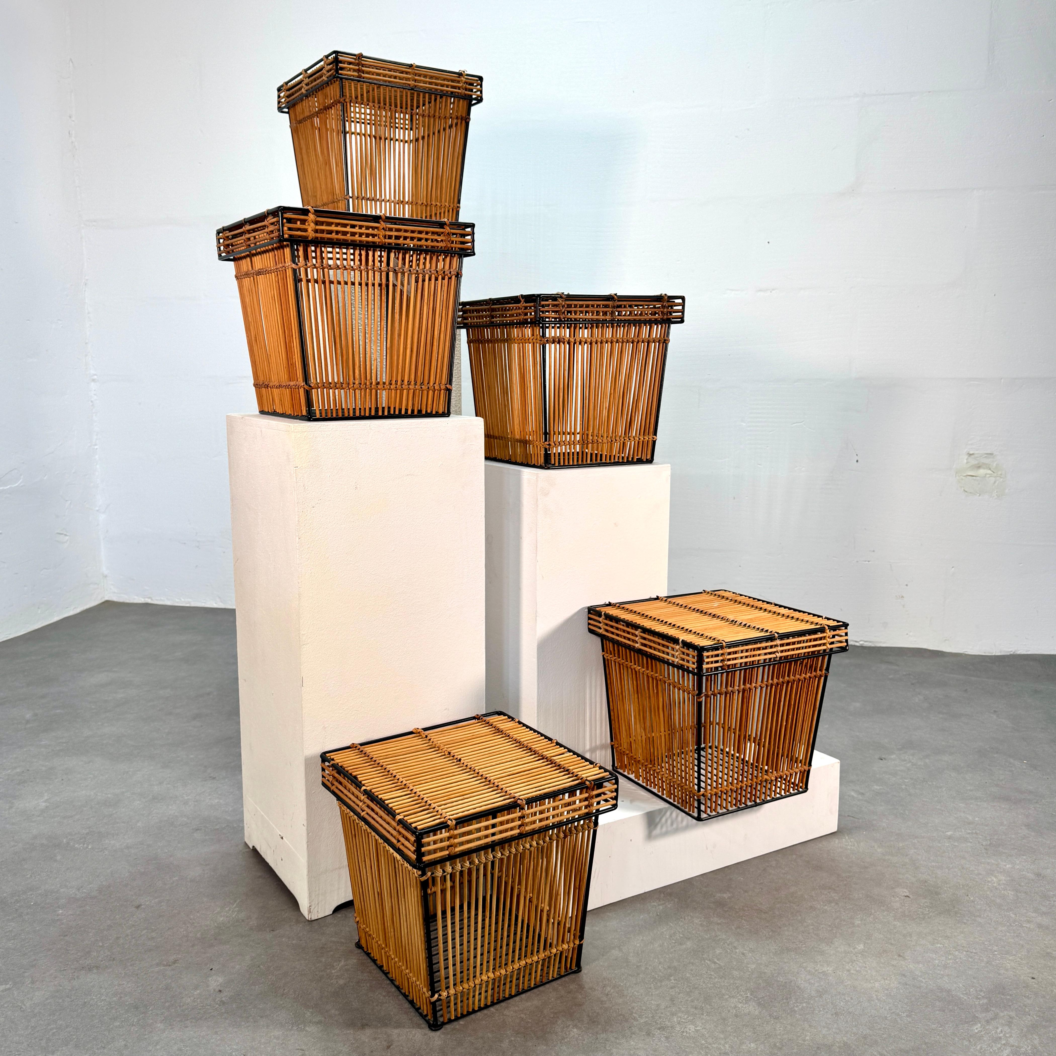 These five rattan and steel baskets with a lid are attributed to Dutch designer, Dirk van Sliedregt, and were manufactured by 'Rohé' Noordwolde, Netherlands in the 1960s.

This Rohé basket has a metal structure covered in wicker. The organic
