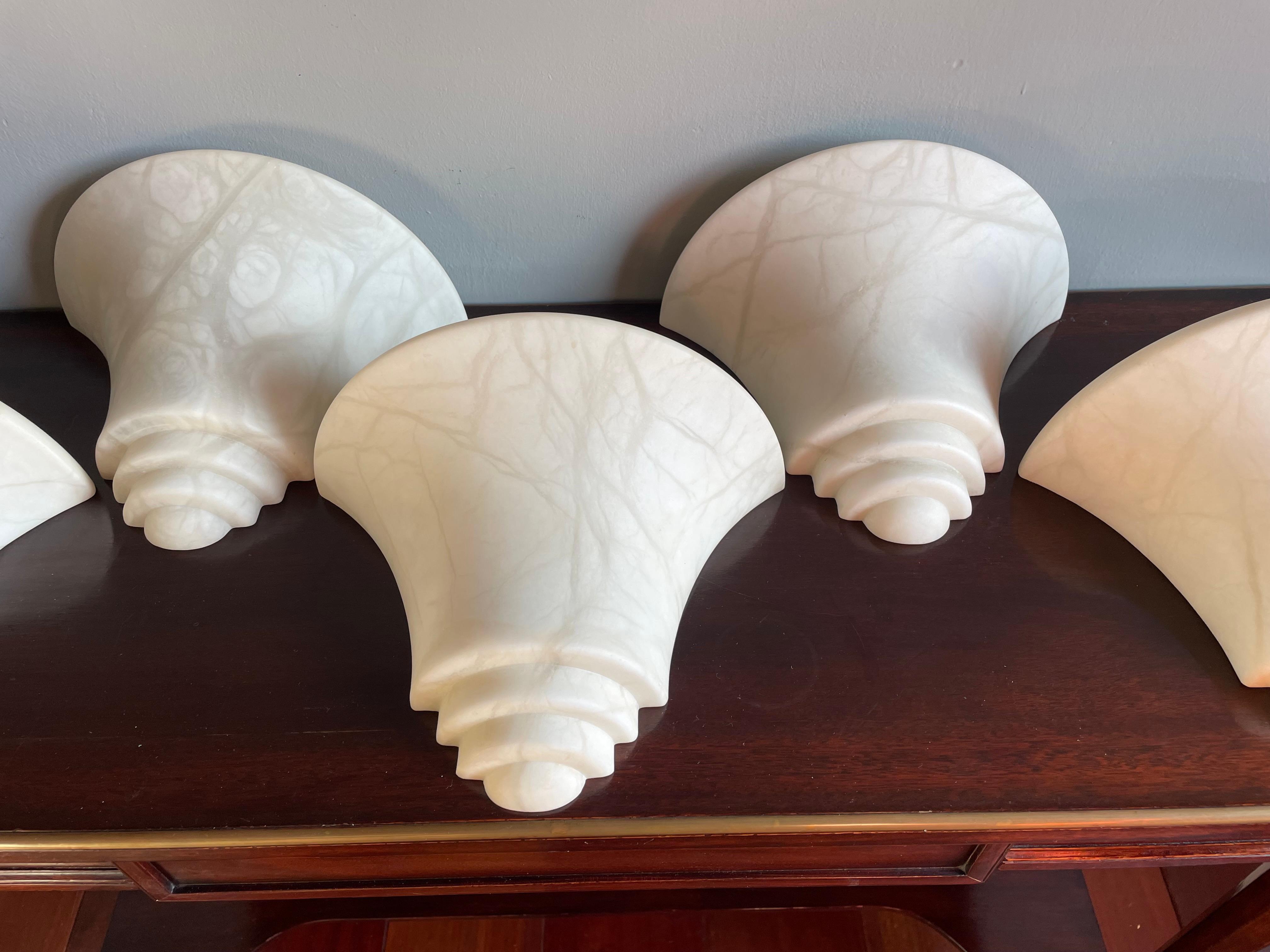 Carved Five Mint Condition Art Deco Style, Midcentury Made Alabaster Stone Wall Sconces For Sale