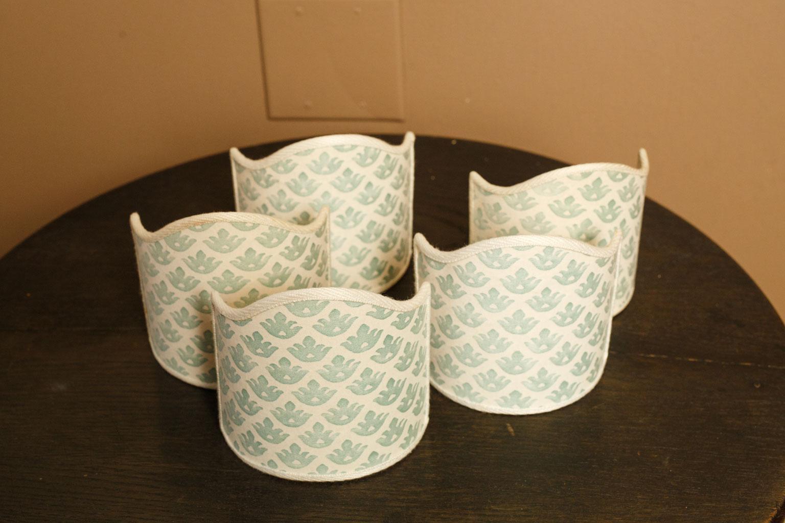 Five petite Fortuny shades in shield shape. Excellent for small table lamps or sconces. Sold as a set of five for $750.