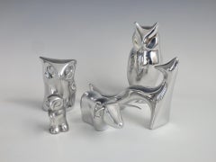 Cinq sculptures de plateau de table Hoselton en aluminium poli Hibou, renard et cerf