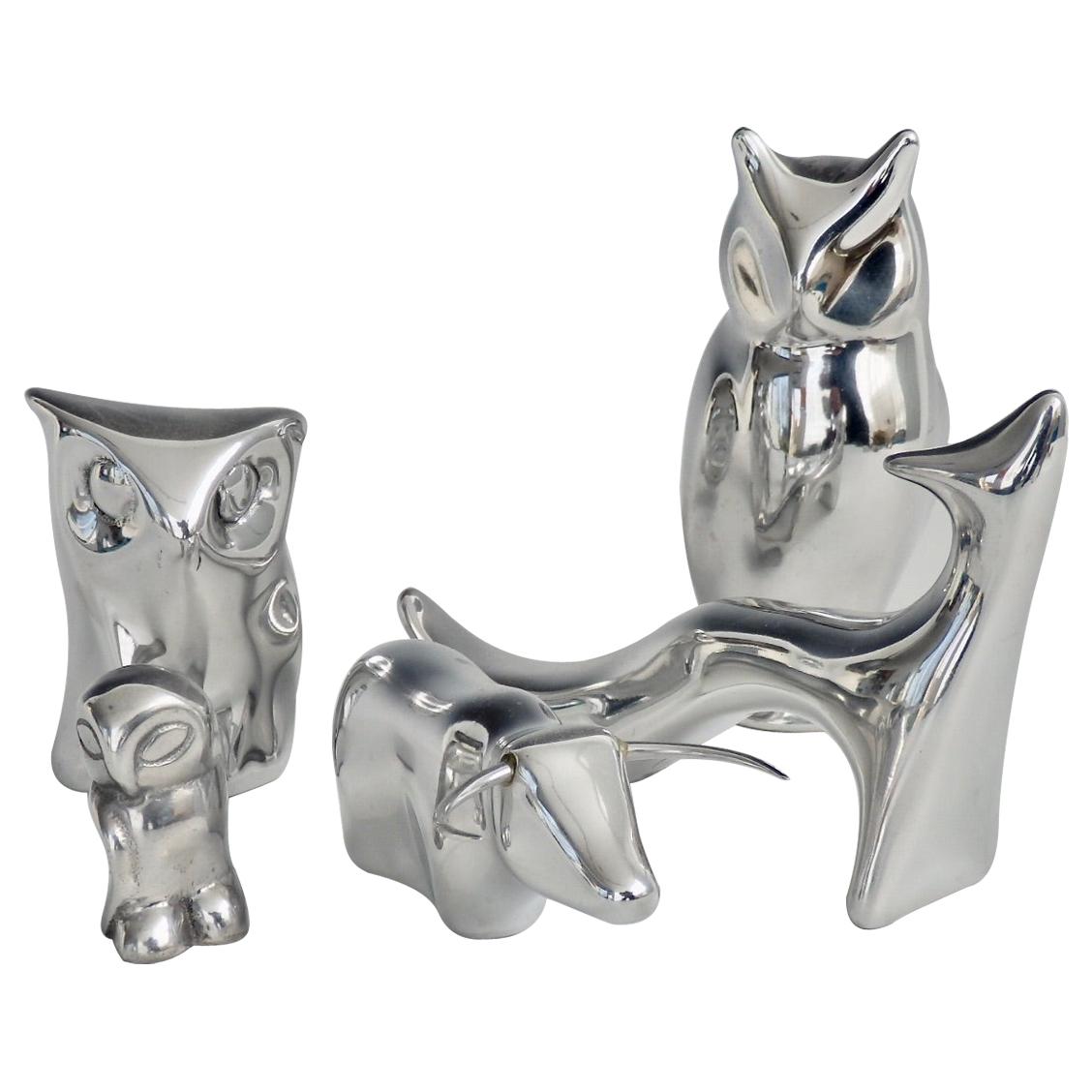 Five-Piece Polished Aluminum Hoselton Collection of Tabletop Sculptures For Sale