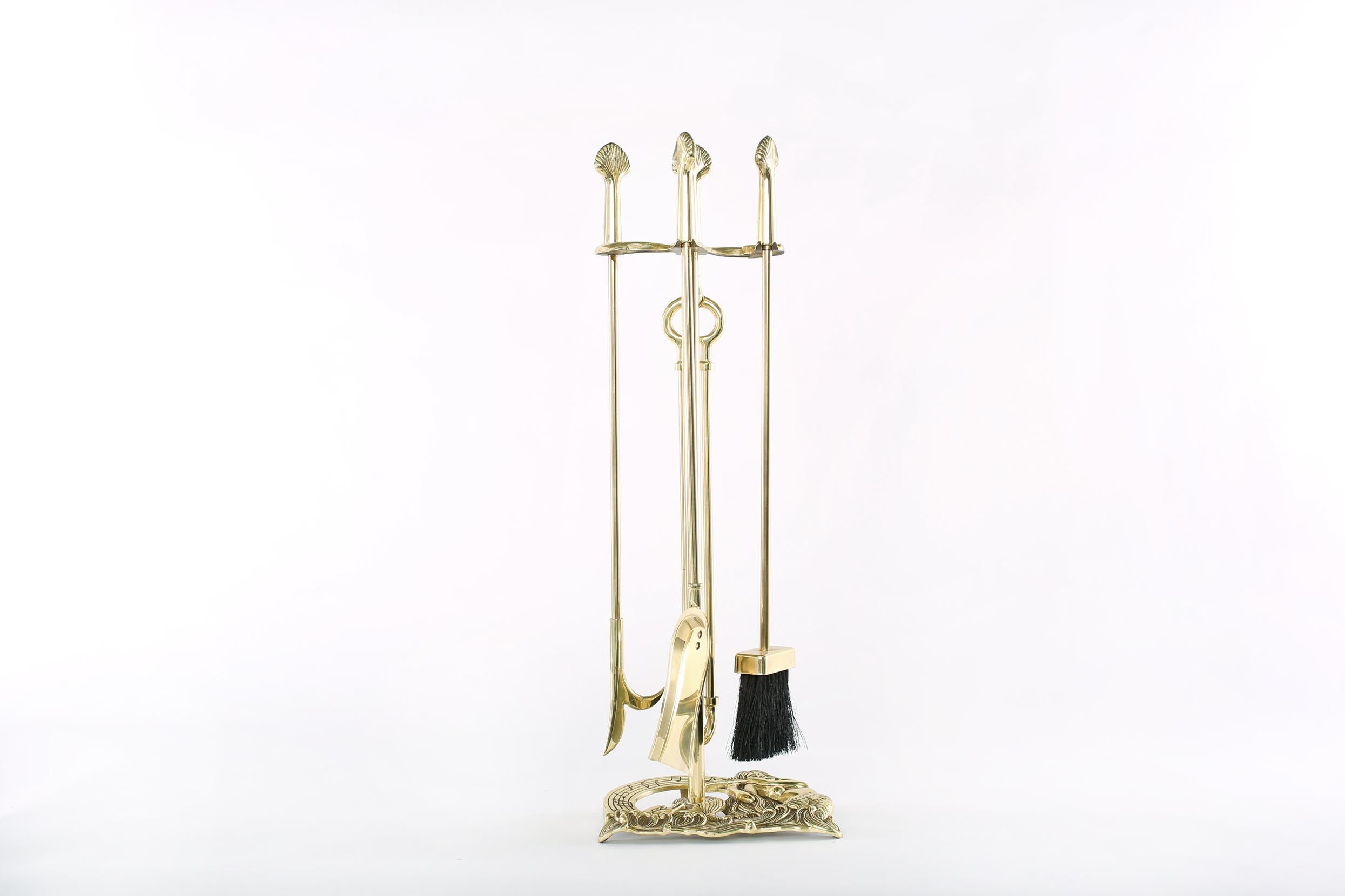 20th century five piece solid brass fire place tools accessories with exterior design details. Set Include, poker, broom, tongs, shovel & tool set. The fire tool stand about 30 inches tall. Base 10 inches x 7 inches.

 