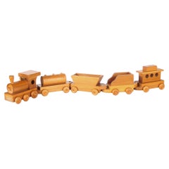 Set di treni in legno a cinque pezzi attribuito alla Montgomery Schoolhouse, Vermont