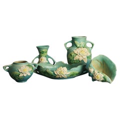 Five Pieces of Blue Roseville Art Pottery with Water Lily Pattern Mid 20th
