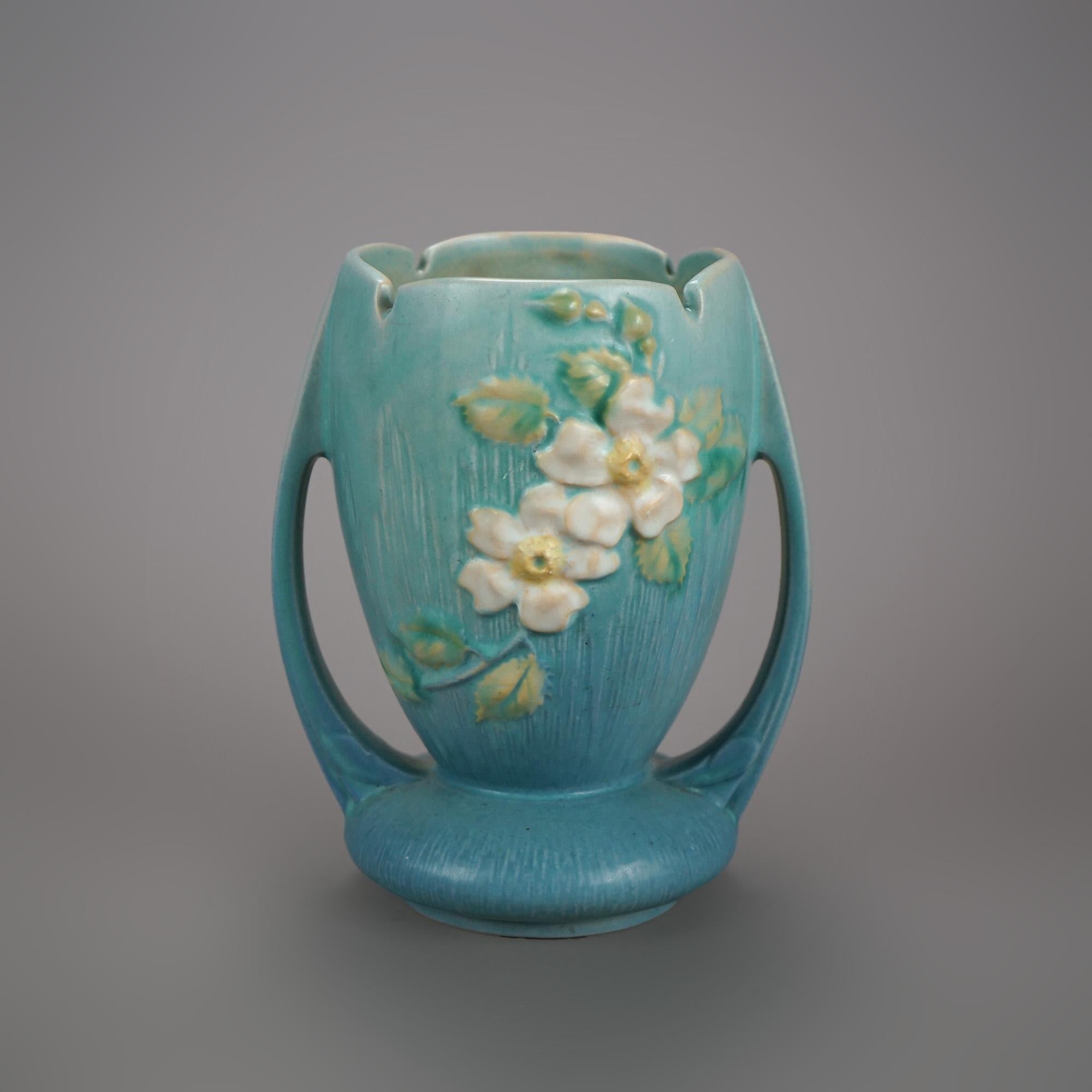 Five Pieces of Blue Roseville Art Pottery with White Rose Pattern Mid 20th

Measures - 7 1/4