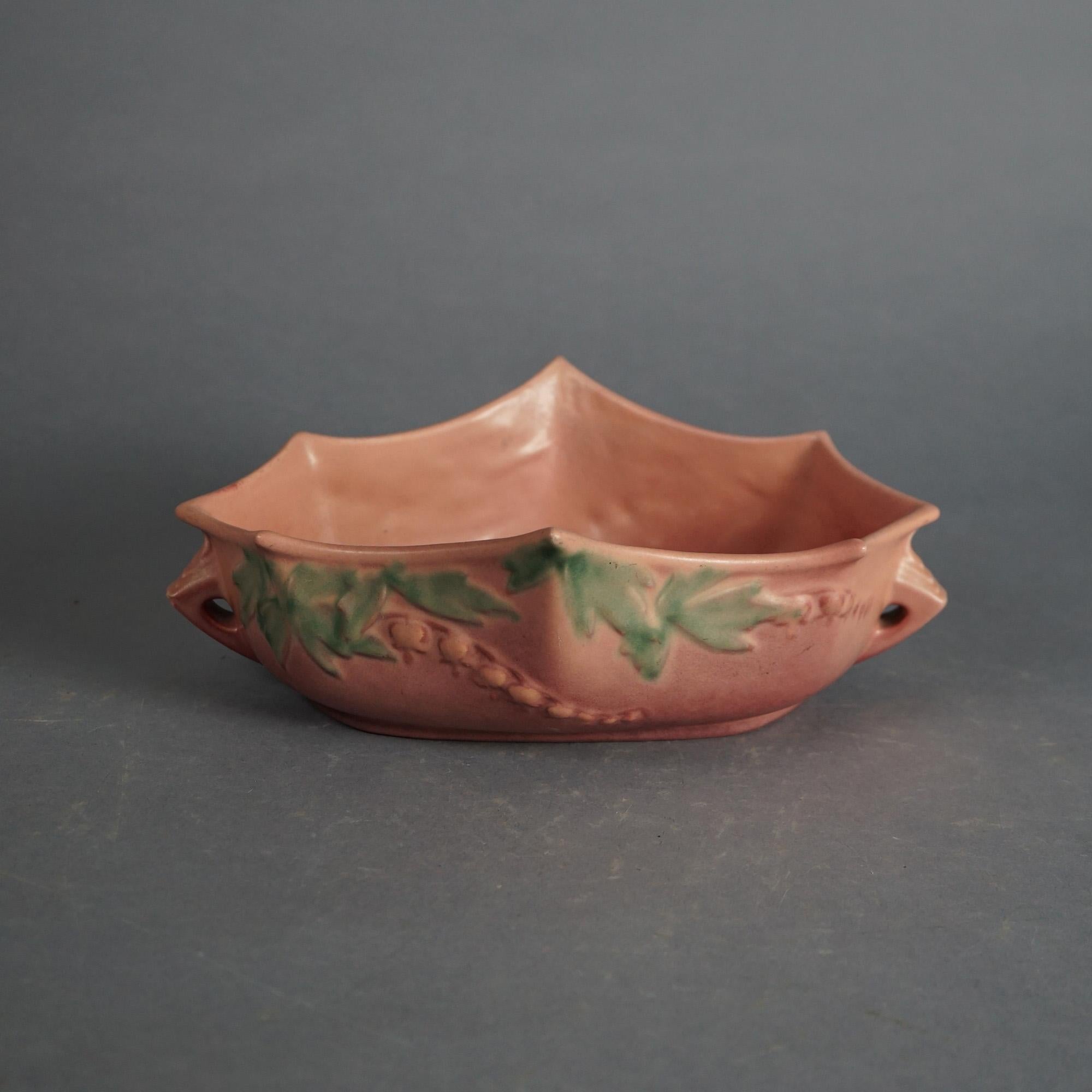 Five Pieces of Pink Roseville Art Pottery with Bleeding Heart Pattern Mid 20thC

Measures - 7