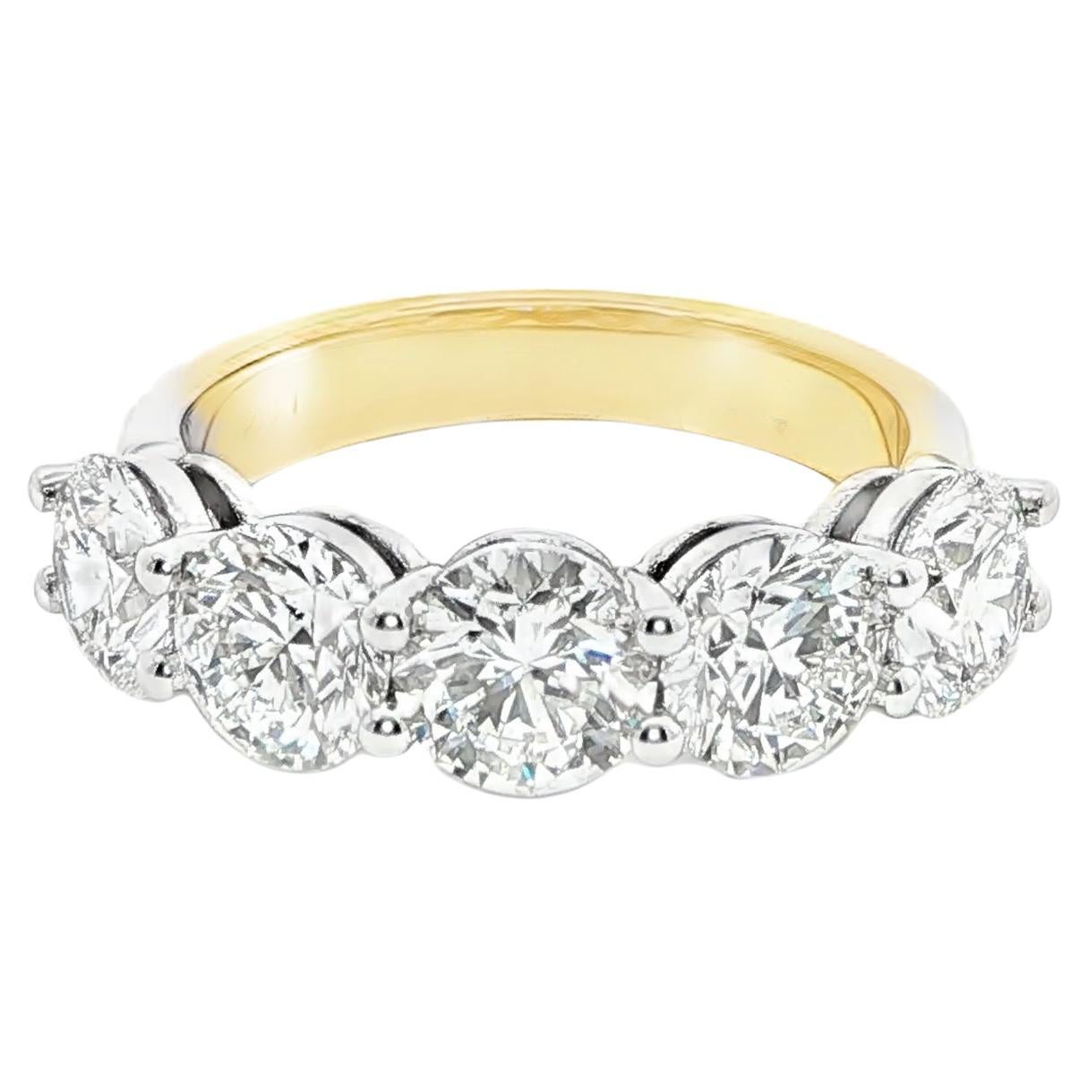 Cinq diamants ronds brillants certifiés GIA en or blanc et jaune 14K