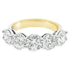 Cinq diamants ronds brillants certifiés GIA en or blanc et jaune 14K