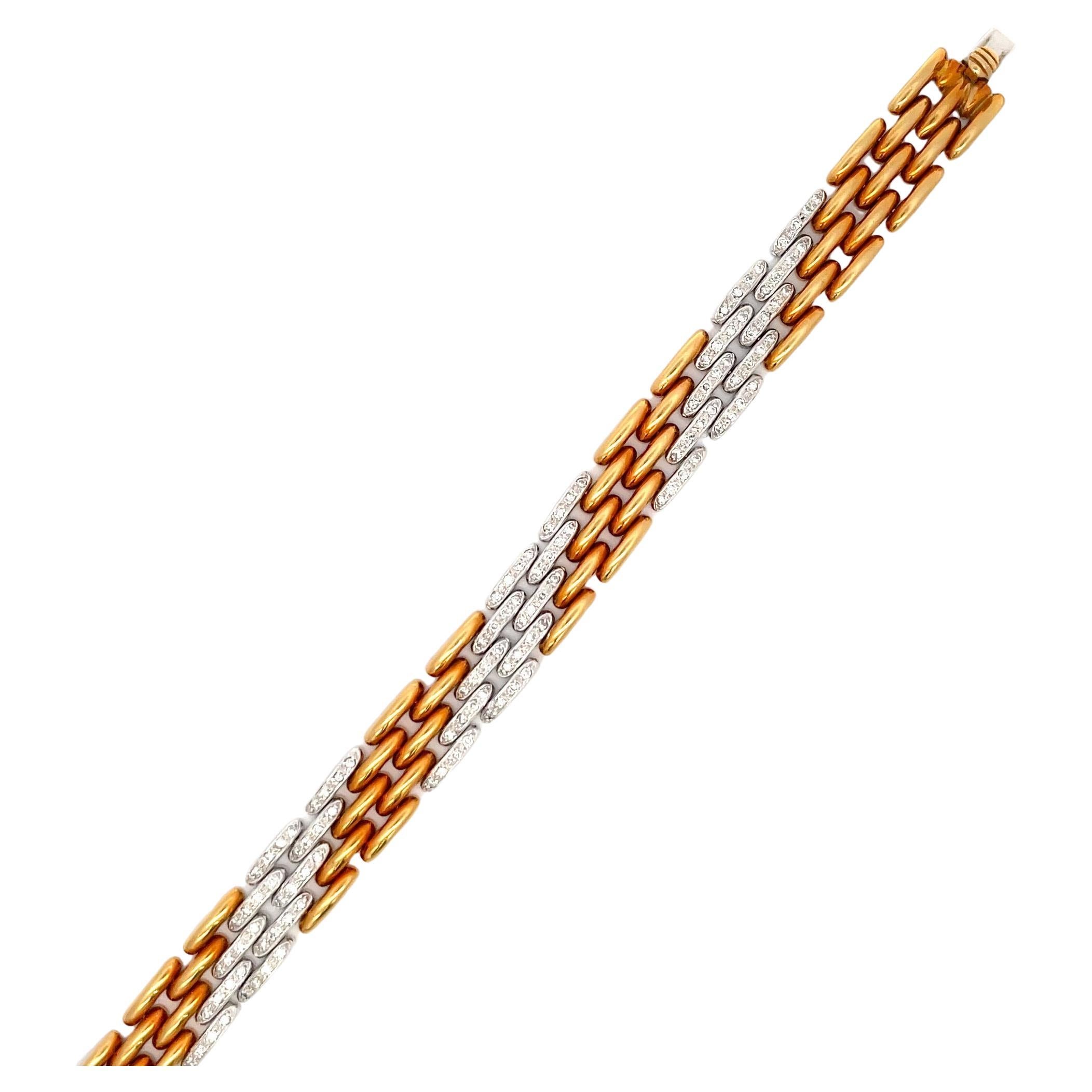 18 Karat Yellow Gold Panther motif bracelet featuring 5 rows of 18 Karat Yellow Gold and Diamond weighing 1.25 Carats, 36.1 Grams.