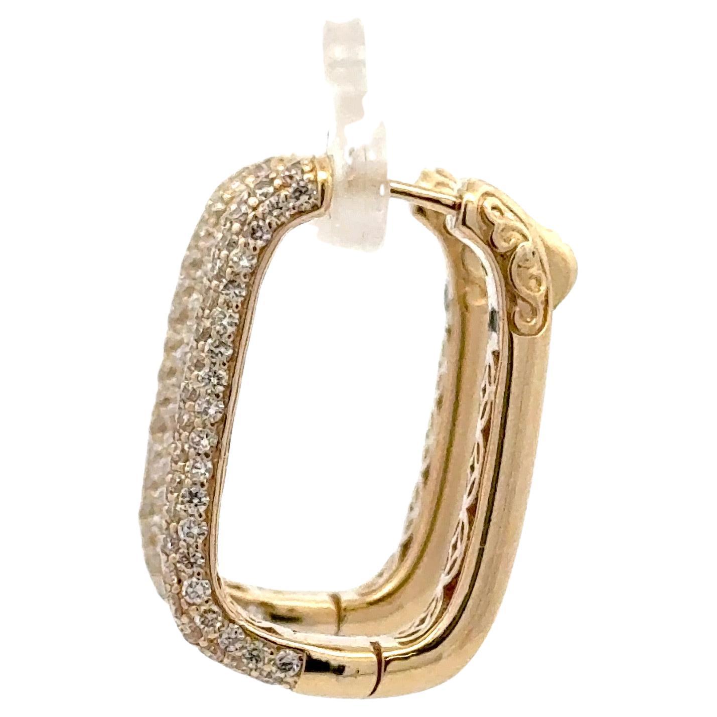 Five row diamond hoop earrings featuring 198 round brilliants weighing 1.95 carats, in a rectangular design 14 karat yellow gold, 7.56 grams.

More Hoop Earrings in Stock
All Sizes & Diamond Weights