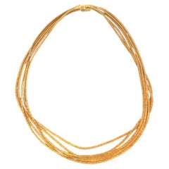 Collana a cinque fili multipli con finitura opaca 62,8 grammi di oro giallo 18 carati