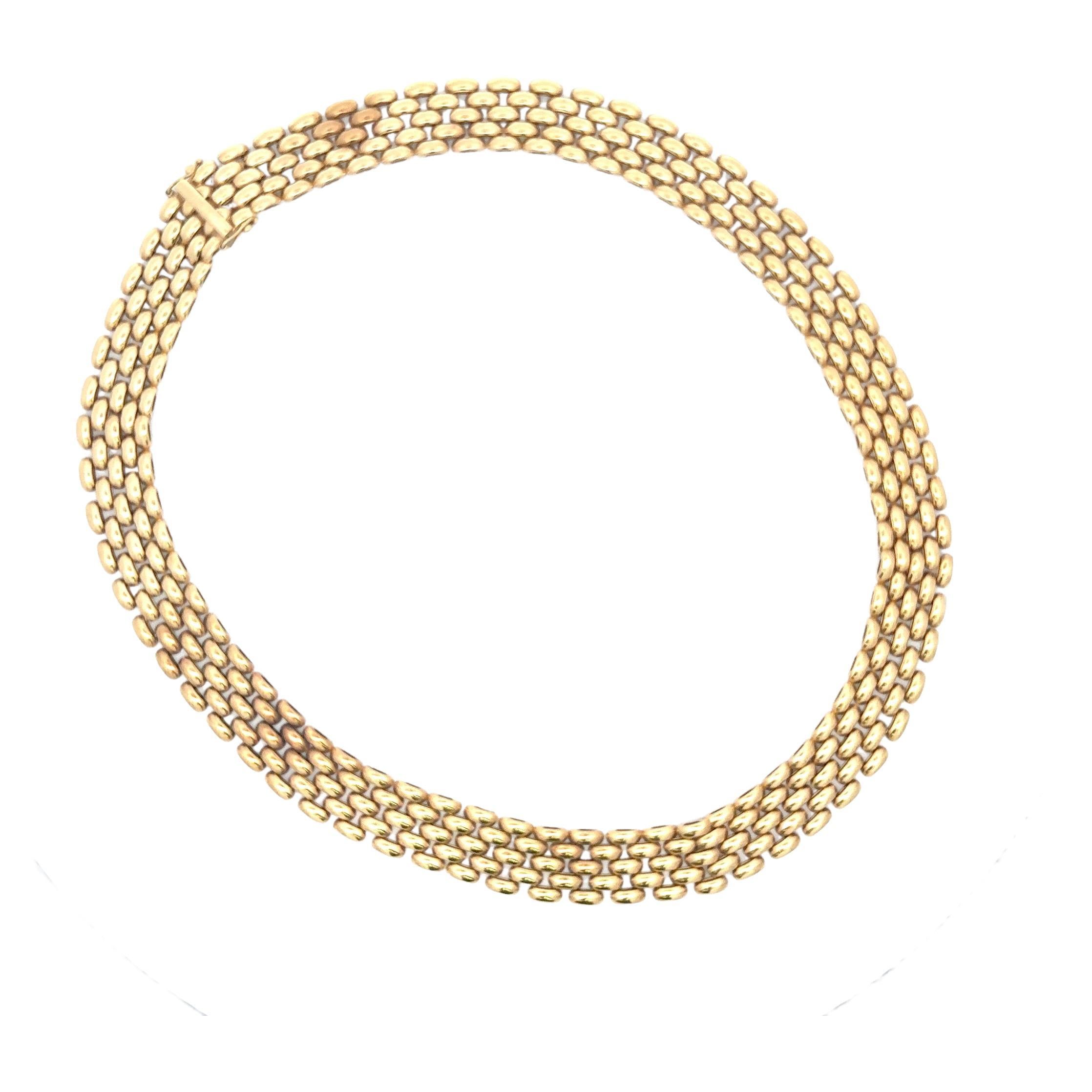 Halskette aus 14 Karat Gelbgold mit einem 5-reihigen Panthere-Glied mit einem Gewicht von 38,1 Gramm, 16,5 Zoll. 

Mehr Panthere Links für Halsketten & Armbänder auf Lager
Suche Harbor Diamonds
