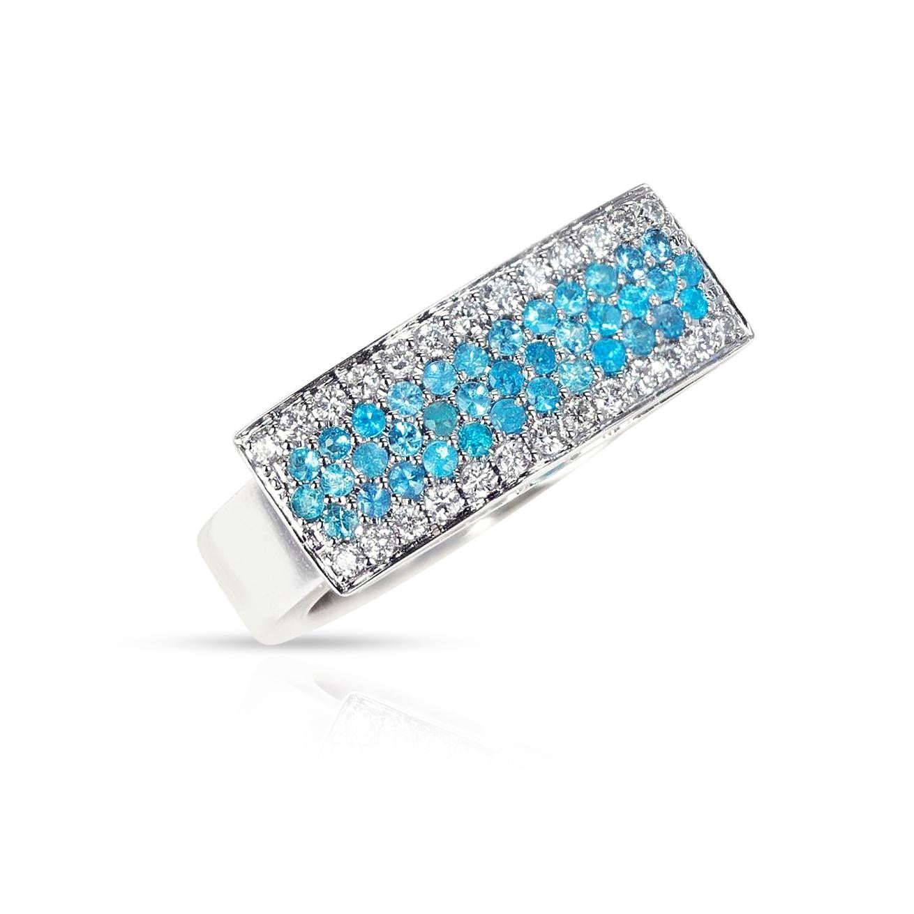 A Five Row Paraiba and Diamond Rectangle Band Ring made in 18 Karat White Gold. The Paraiba weighs 0.39 cts and the diamonds weigh appx. 0.26 cts. The total weight of the ring is 9.80 grams. The ring size is US 6.50.