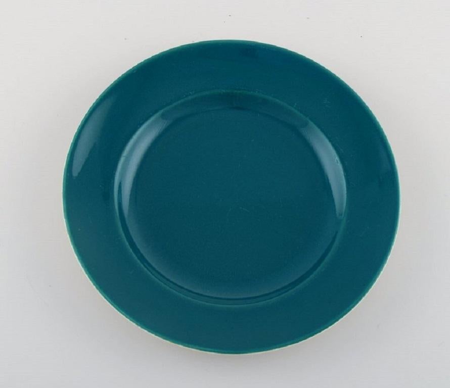 Five Royal Copenhagen / aluminia confetti plates in turquoise glazed faience. Mid-20th century.
Diameter: 17.5 cm.
In excellent condition.
Stamped.
1st factory quality.