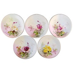 Five Royal Worcester Plates with Floral Motifs, circa 1930s