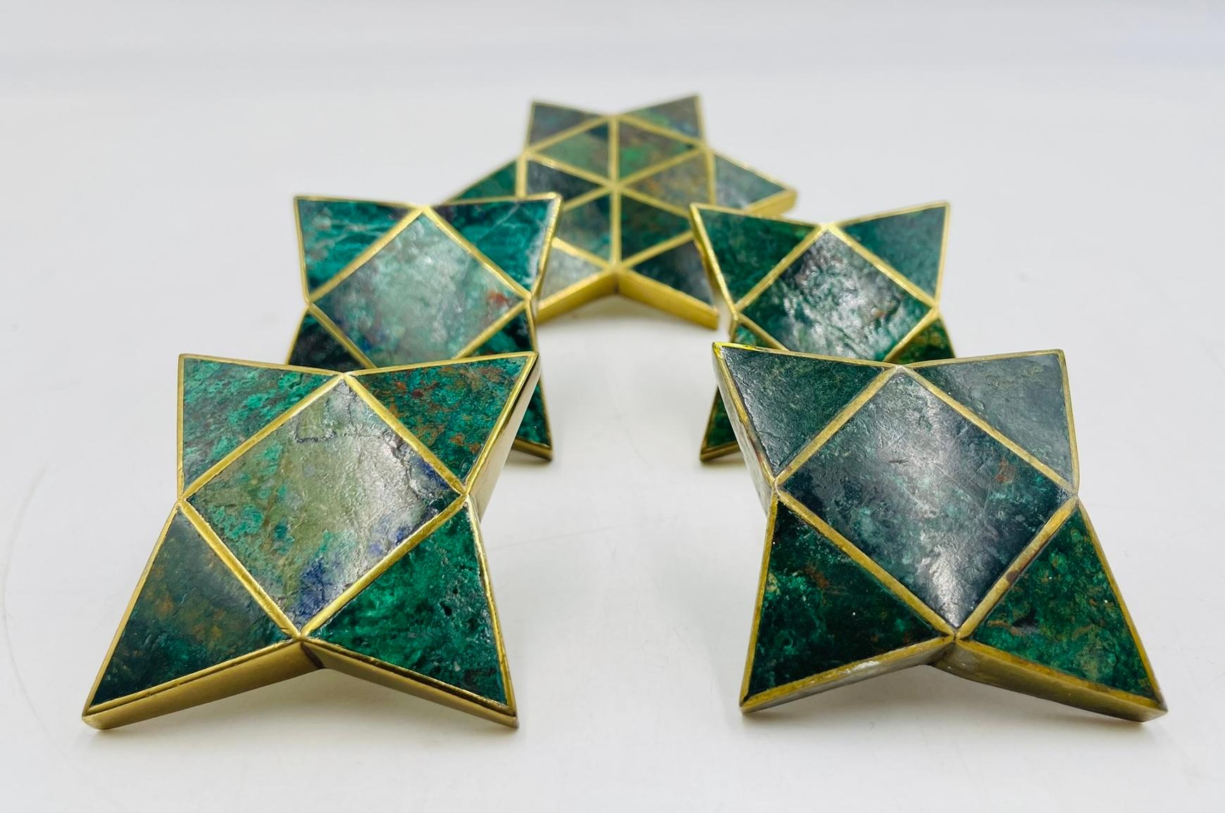 Enhance the elegance of your doors with this exquisite set of Five Star Shaped Door Pulls by Los Castillo, crafted in Taxco, Mexico in the 1950s. 

The pieces are made from a luxurious combination of brass and stone, these door pulls feature a