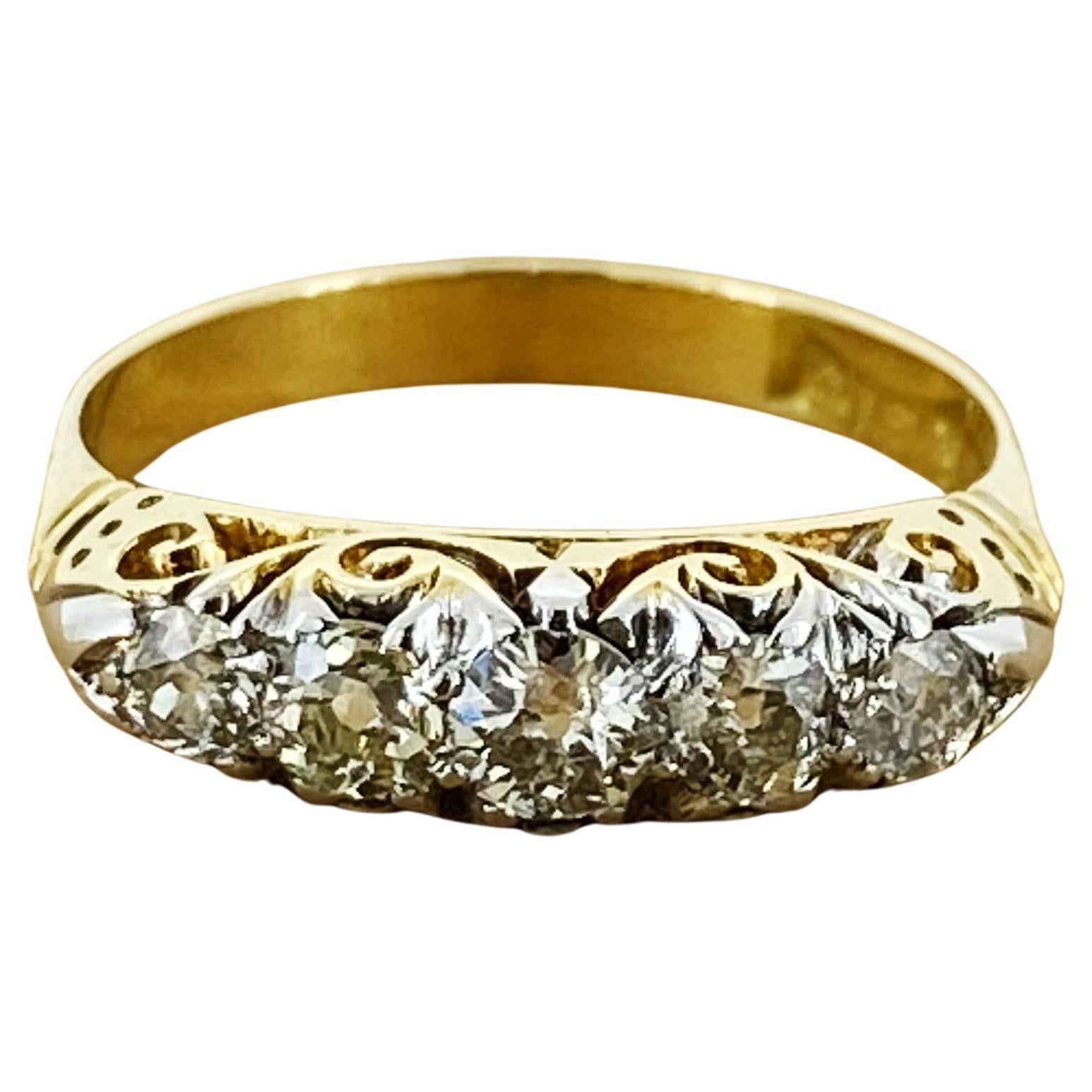Bague rétro demi-hoop en or jaune 18K et platine avec cinq pierres et un diamant de 0,80ct en vente