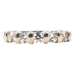 Bague en or blanc 14 carats sertie de cinq diamants