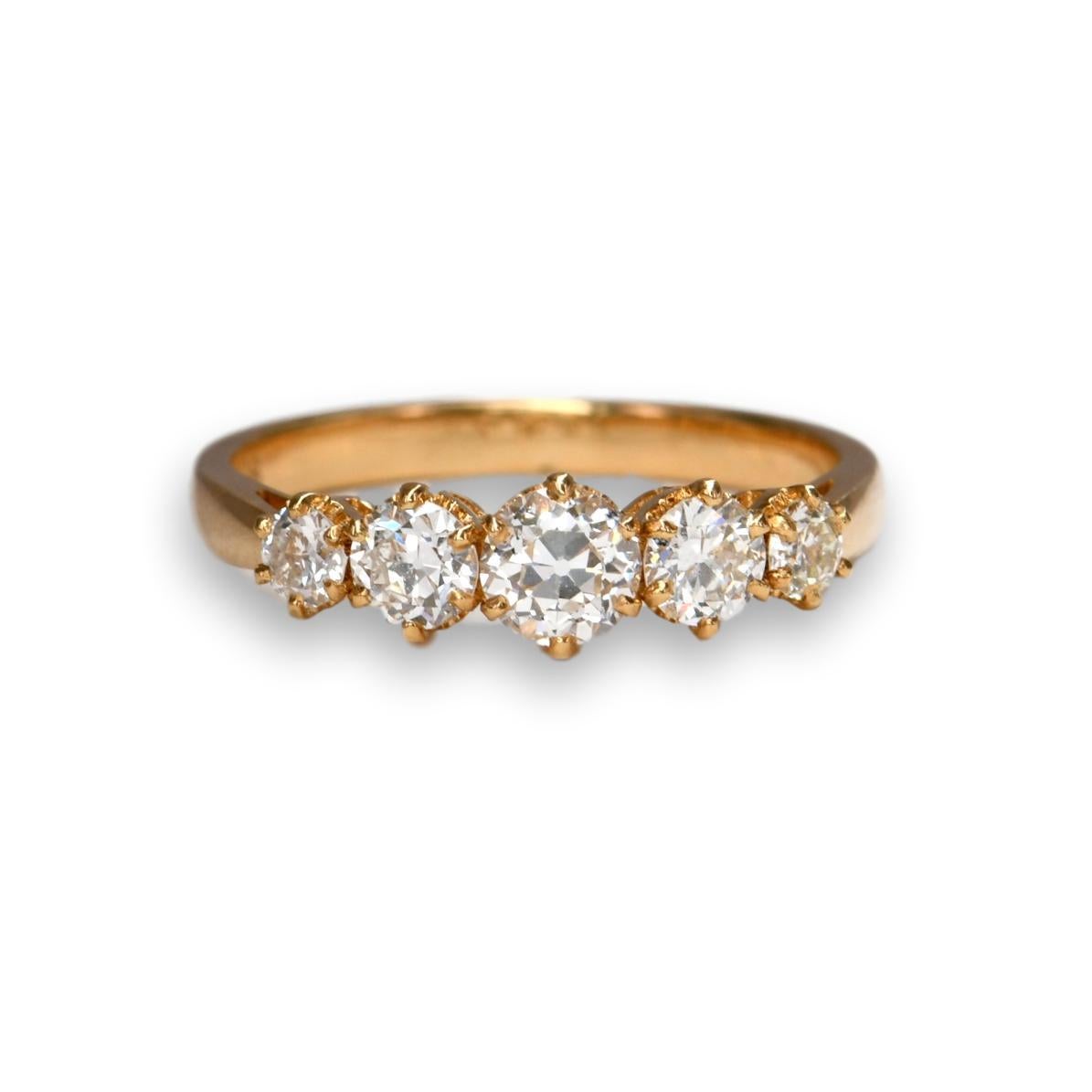 Total Diamonds: 1.25ct
Colour: H 
Clarity: VS
18K Yellow gold
Ring size: UK N, USA 6 1/2

This five stone diamond ring has wonderful lively old European cut diamonds. They catch and reflect the light really showing off the sparkle. The diamonds are