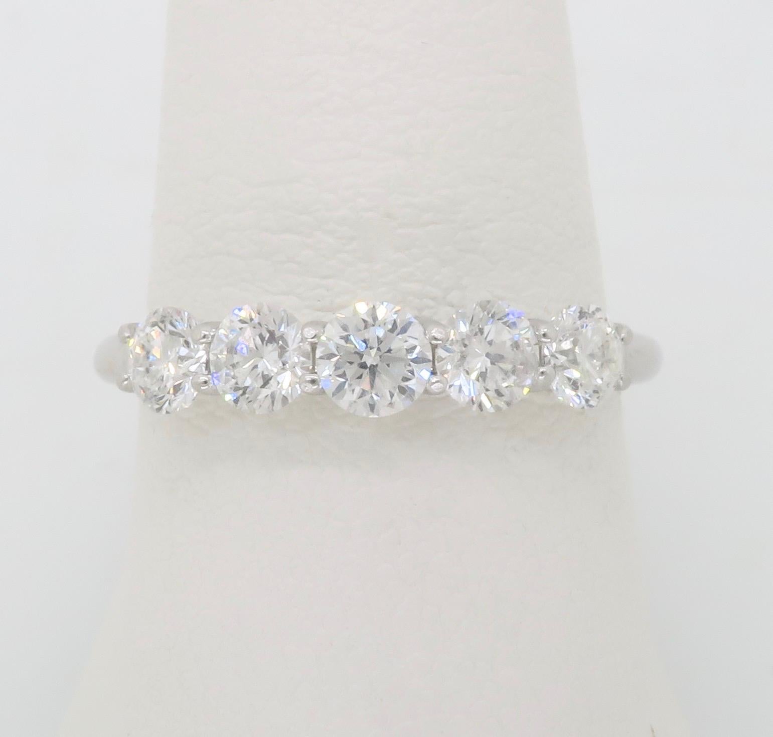 Five Stone Diamond ring featuring .85CTW of diamonds made in White Gold.

Diamond Carat Weight: Approximately .85CT
Diamond Cut: Round Brilliant 
Diamond Color: G-H
Diamond Clarity: SI1-SI2
Metal: 14k White gold
Ring Size: 6.75
Marked/Tested: