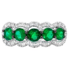 Fünfsteiniger Smaragd-Ring mit Diamantfassung aus 18 Karat Weißgold