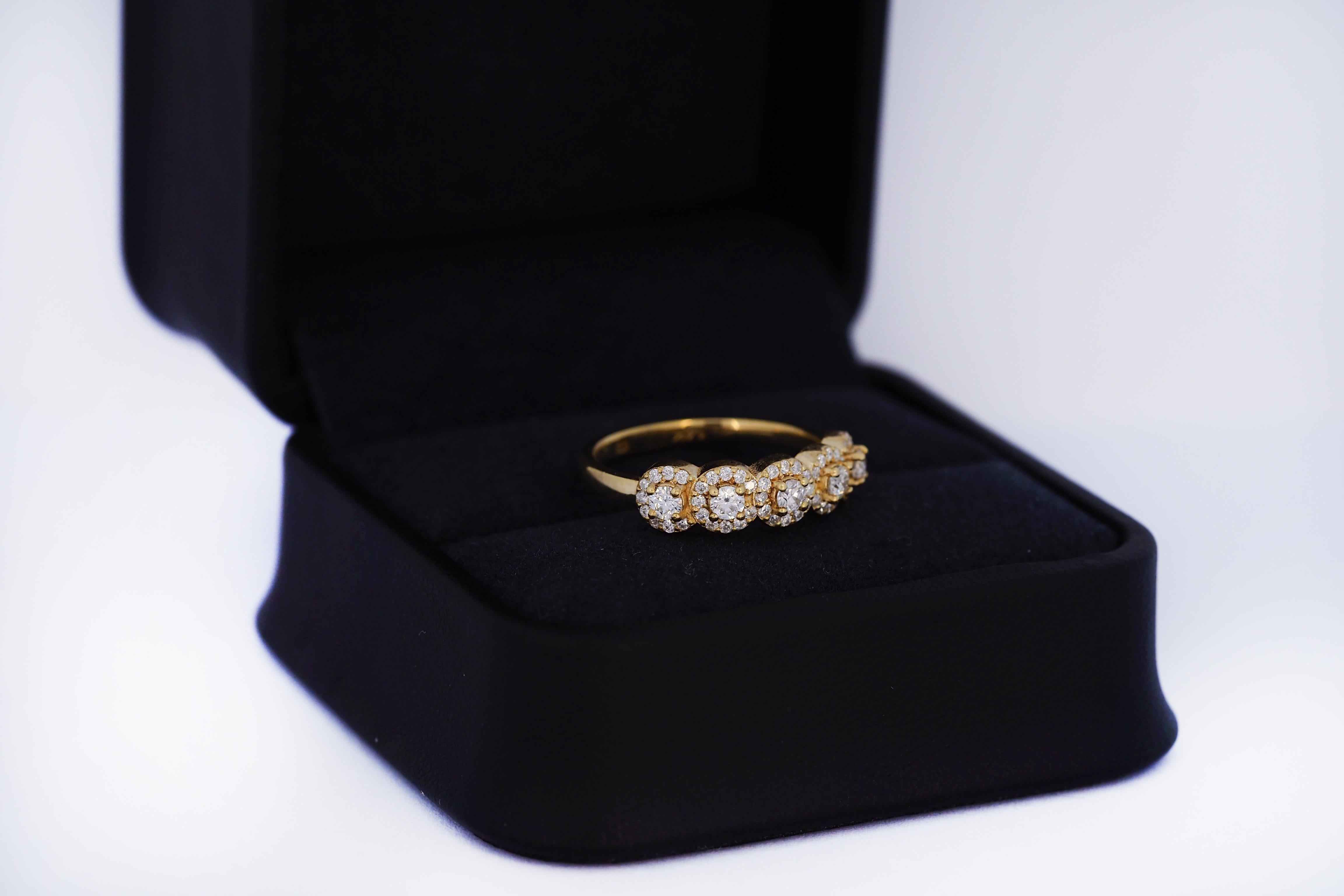 in vendita:  Fede nuziale con cinque pietre a raggiera in oro 14k 7