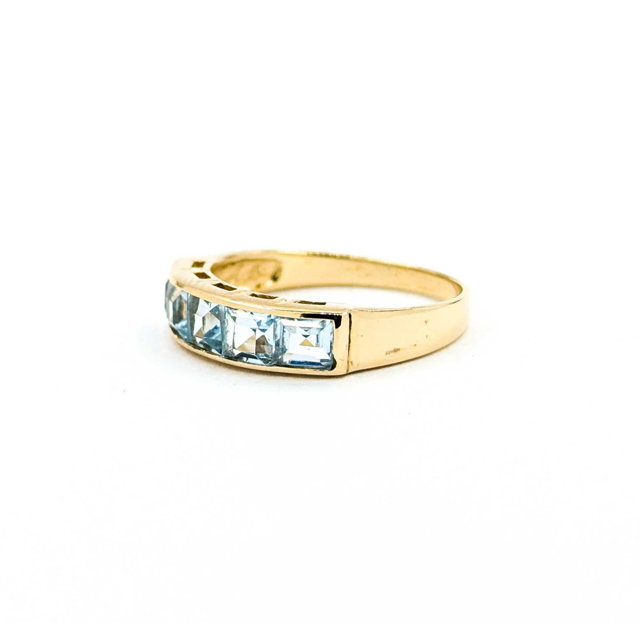 Square Cut Five-Stone Sky Blue Topaz Ring in 14k Yellow Gold For Sale