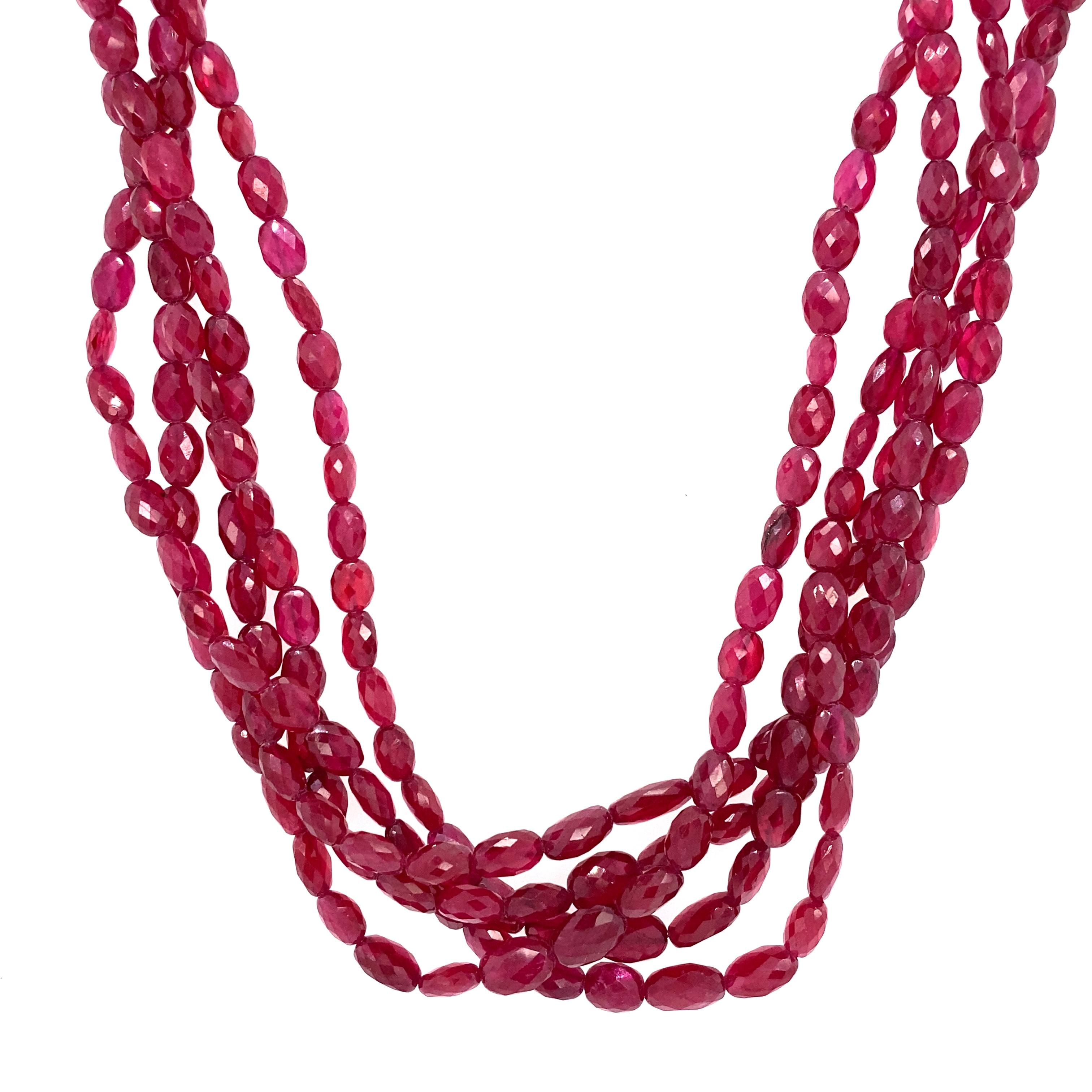 Circa: 1990s
Metal Type: 18 Karat Gold
Weight: 48 grams
Dimensions: 17 inch length 

Ruby Details:

Carat: Approximately 210 carat total weight
Shape: 5mm-6.5mm beads
Color: Vivid red