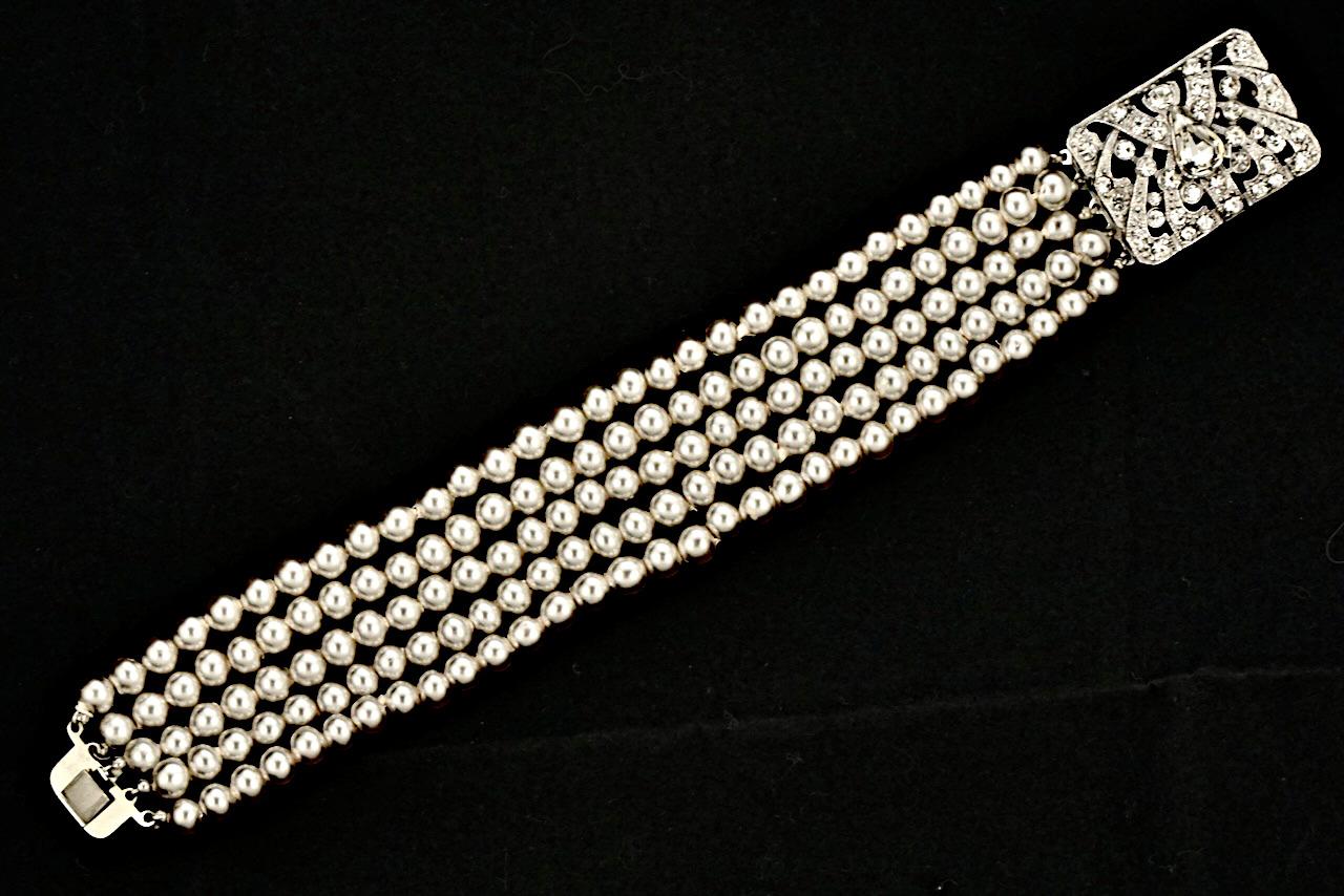 Five Strand Faux Pearl Bracelet with a Rhinestone Silver Tone Clasp For Sale 1