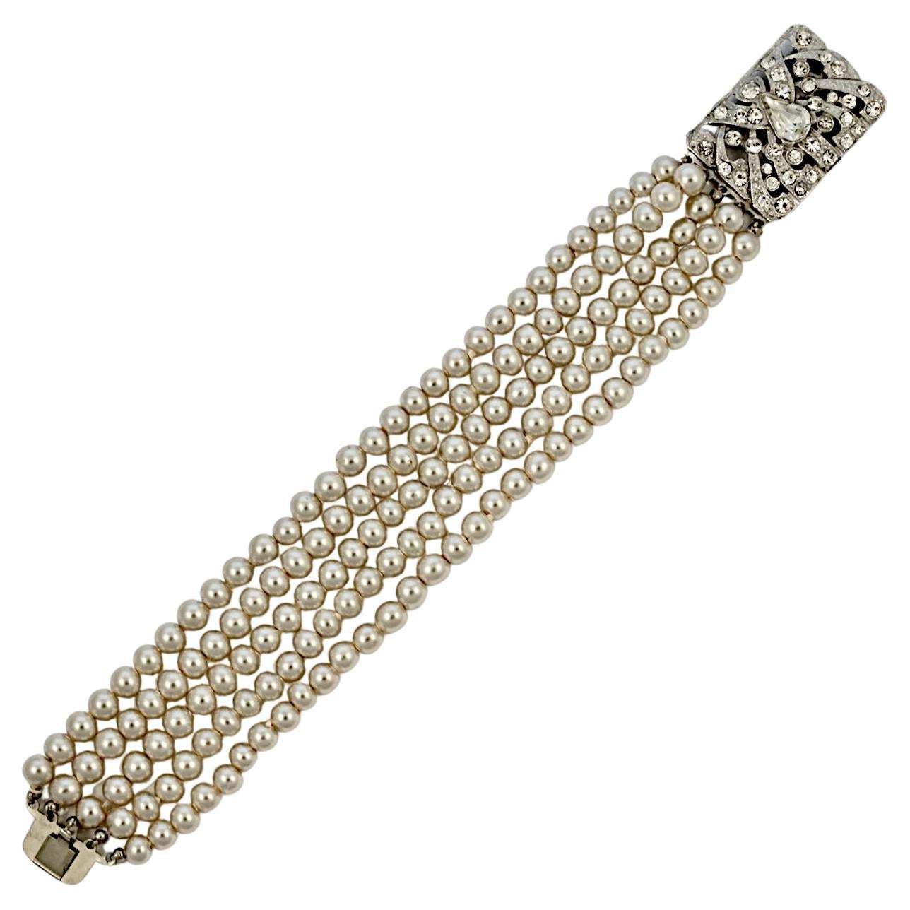 Five Strand Faux Pearl Bracelet with a Rhinestone Silver Tone Clasp For Sale