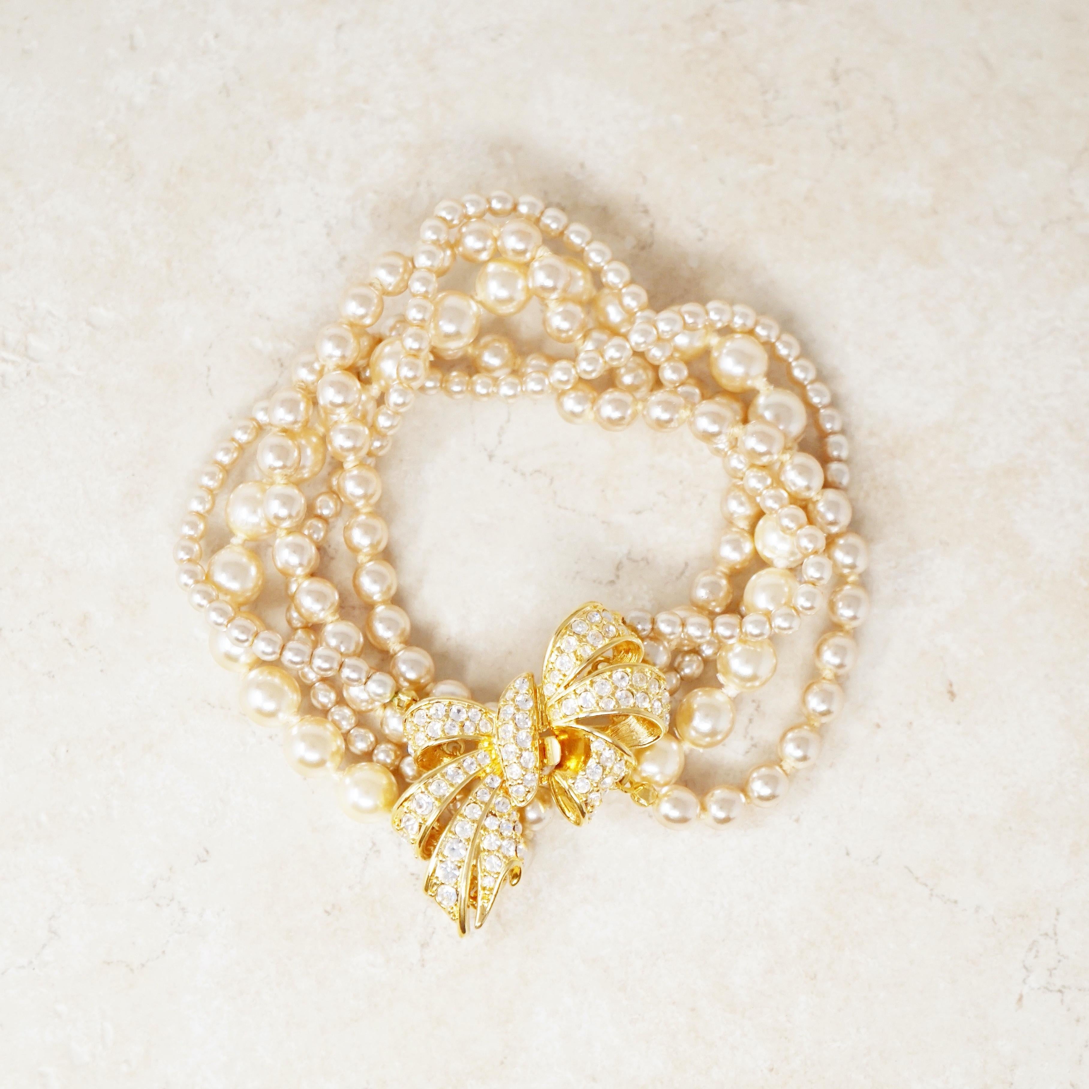 Women's Five Strand Pearl Bracelet with Crystal Pavé Bow Clasp by Nolan Miller, 1980s