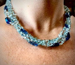 Five strands aquamarine faceted oval beads with blue topaz