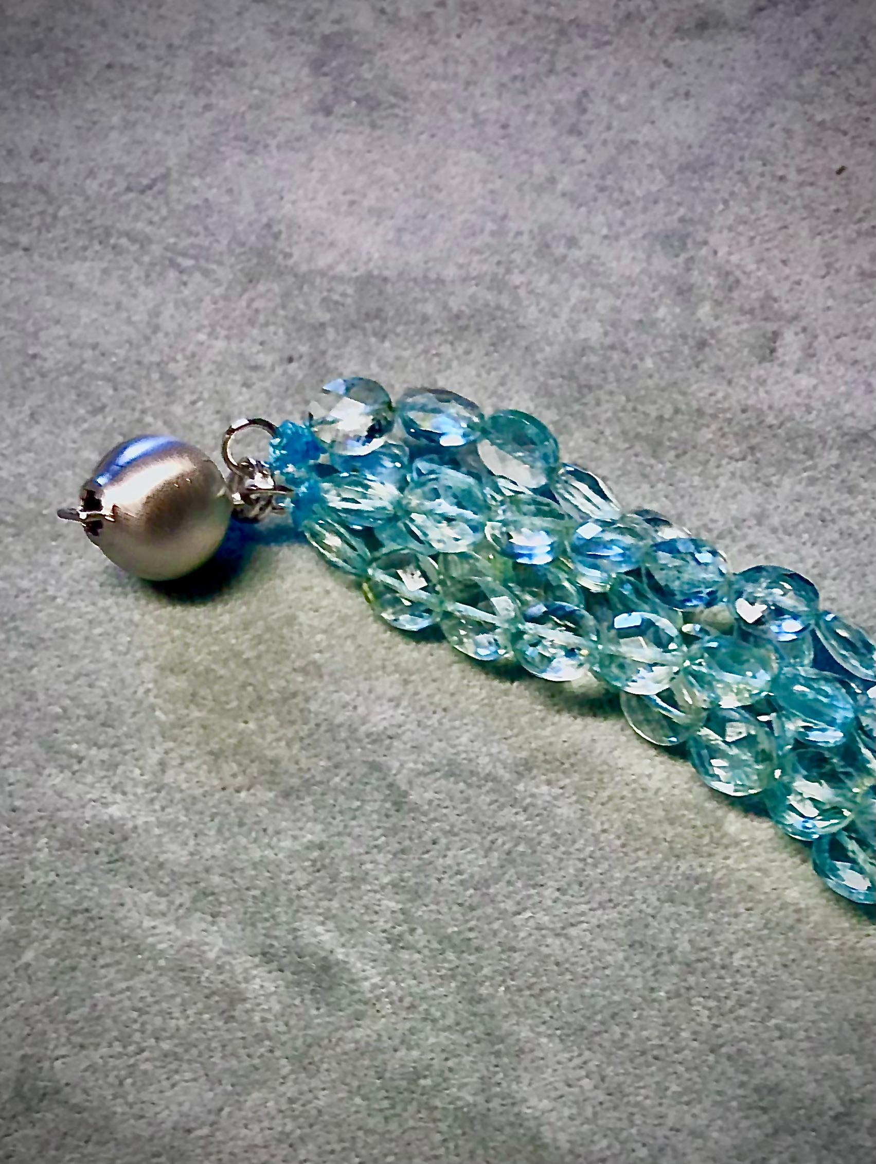 Artisan Five strands aquamarine faceted oval beads with blue topaz For Sale