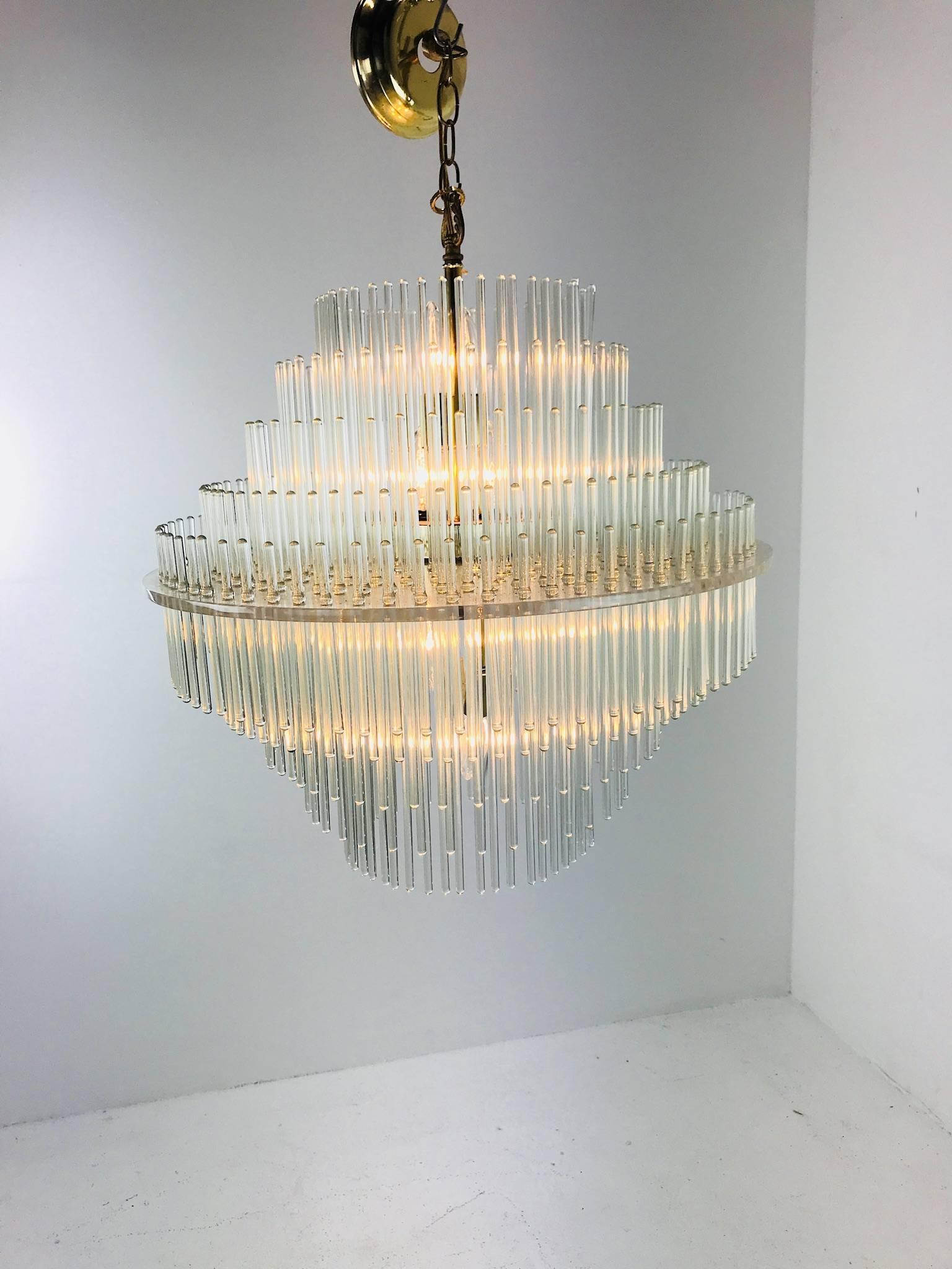 Five-tier glass rod chandelier by Sciolari for Lightolier. Chandelier shows wear from use and age. Original wiring, circa 1960s

Dimensions: 23