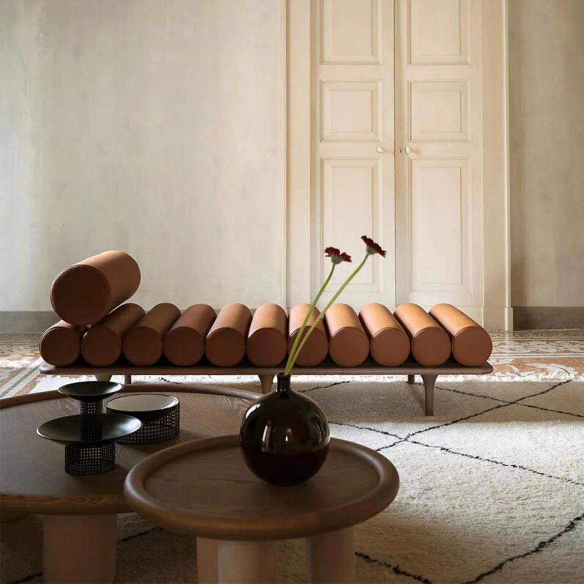 The Five to Nine daybed is the centerpiece of a refined, imaginary artist’s atelier: a piece of furniture with a strong identity, designed to meet the increasingly versatile needs of contemporary living with style and functionality.

Design by