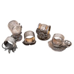 Five Victorian Silverplate Floral Napkin Rings