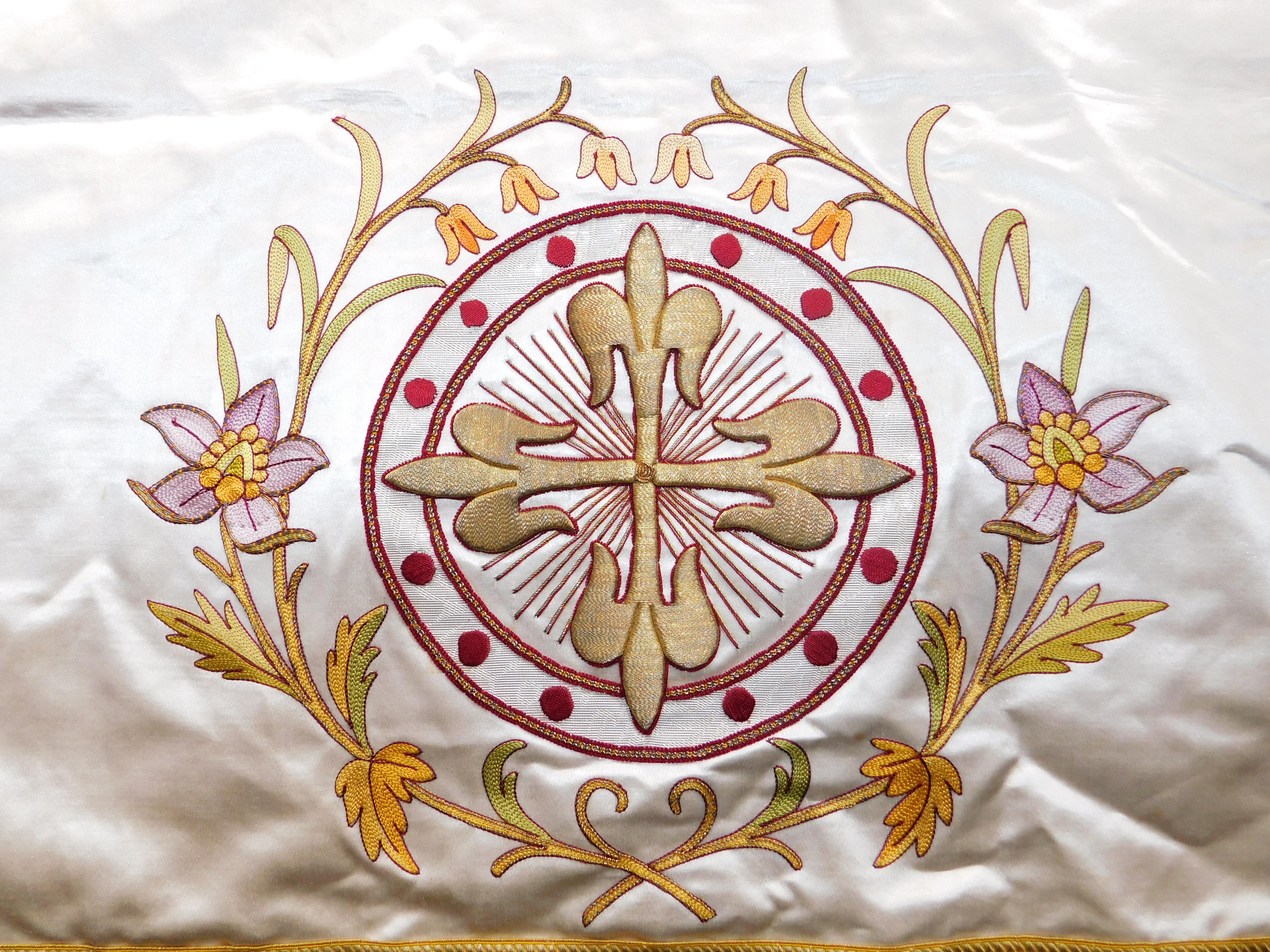 A group of five ecclesiastical textiles, circa 1940. In good condition and easily made into a pillows. One is velvet with gilt edging, One is silk satin with heavily embroidered design in gold bullion and silk chain stitch embroidery, Three are silk
