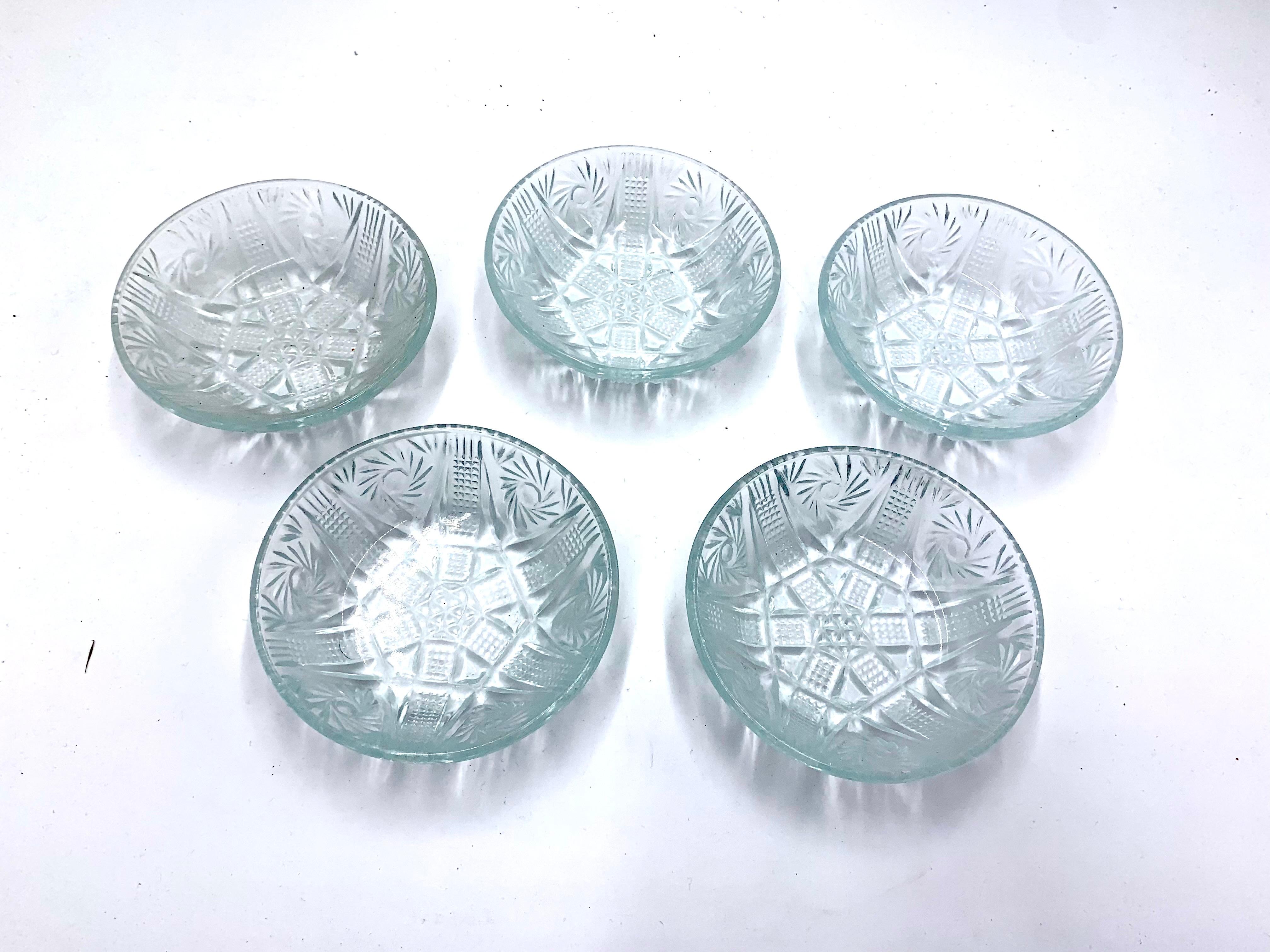 Five clear glass small coasters, made in Poland in 1960s. 
Very good condition.