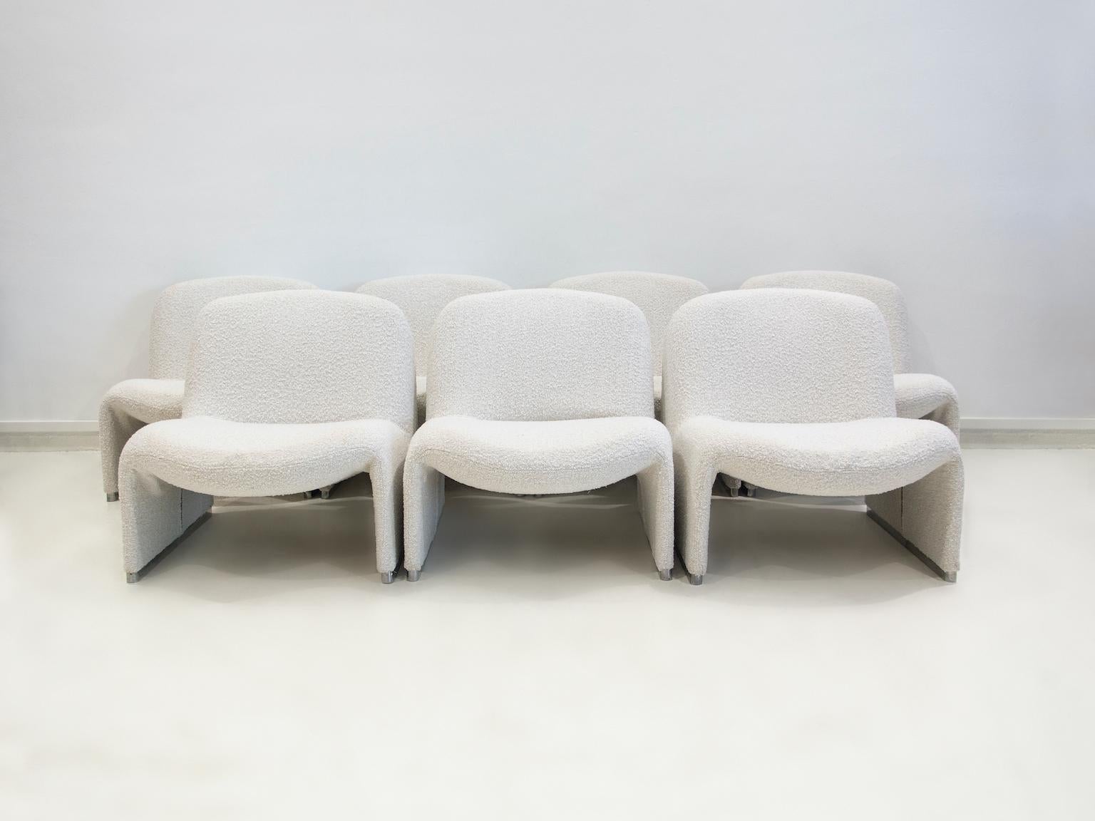 Five Alky easy chairs on aluminum runner legs, reupholstered with white bouclé fabric. Alky was designed by Giancarlo Piretti in 1969. Manufactured and marked by Anonima Castelli. Versatile and comfortable chairs with smooth lines. Please note that