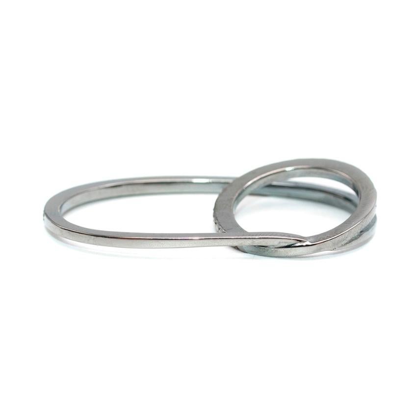 Fiya Bijoux Rhodium Plated Diamond Floating Knuckle Ring

- Diamond Encrusted Detail across Top 
- Two Interlocking loops 
- Rhodium Metal plated white gold

Please note, these items are pre-owned and may show signs of being stored even when unworn