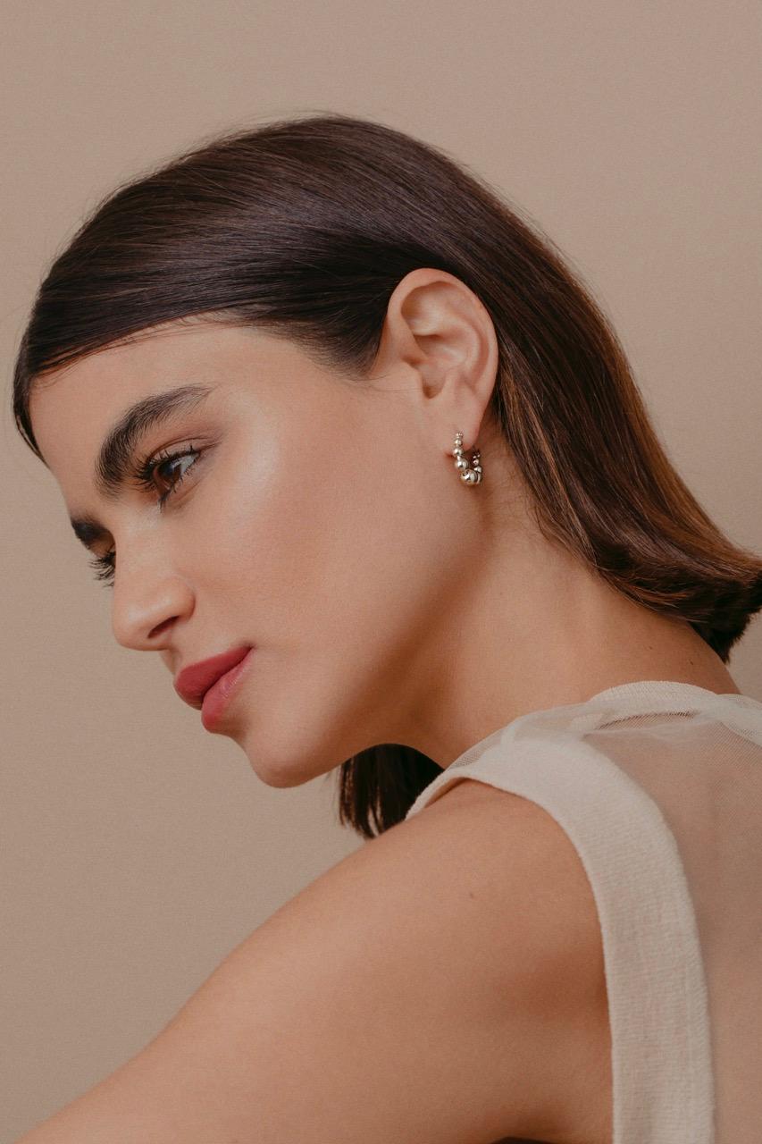 Inspired by the memories of summer getaway in Mykonos and lazy summer brunches with friends, the Fizz collection will add an effortless sparkle to your daily look.
Wear alone or with a matching bracelet - Fizz Bracelet

 Made from 7 hollow sterling