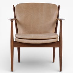 FJ 51 - Pair of lounge chairs in walnut by Finn Juhl