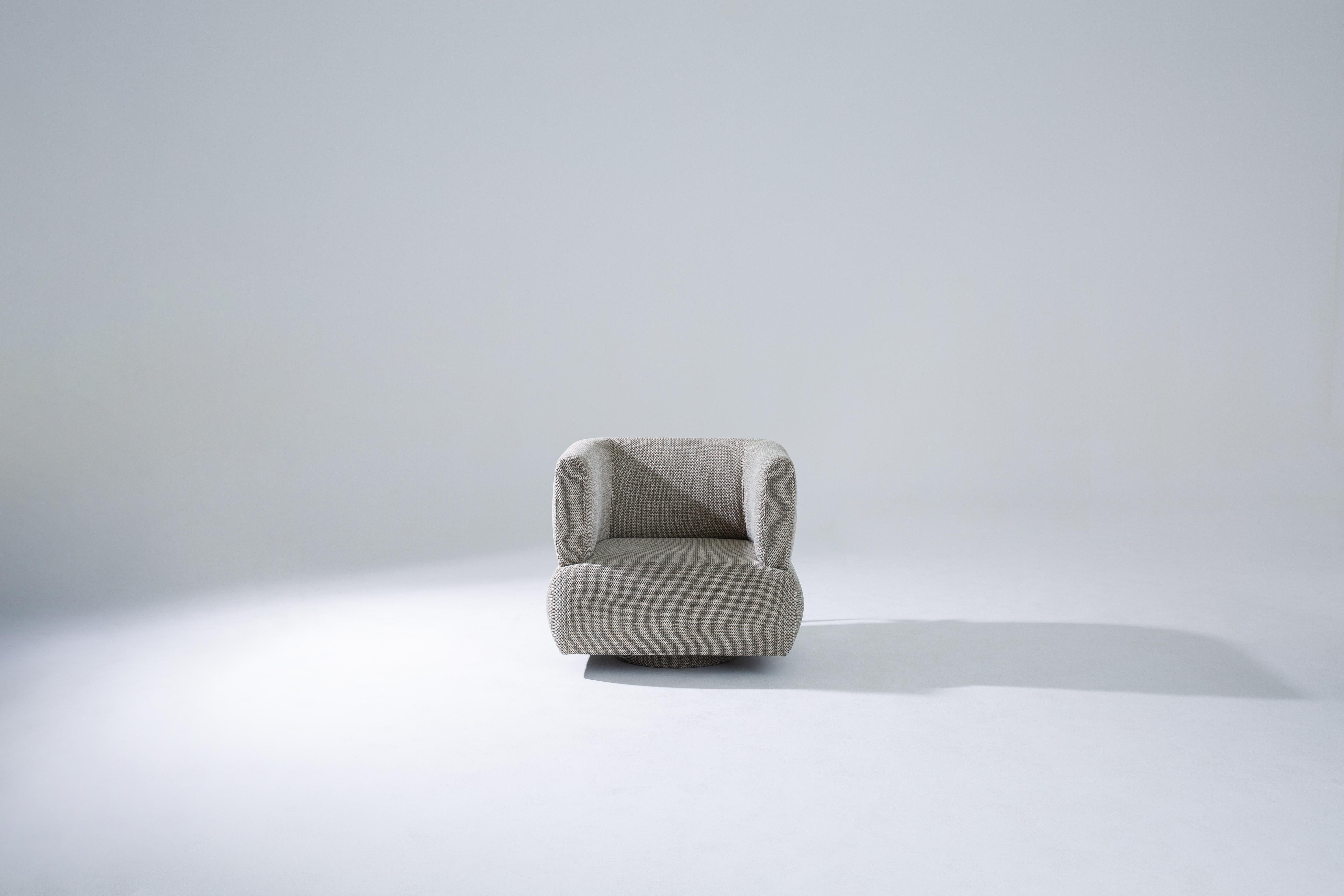 The FJN armchair by +55design is a quiet invitation to unwind—an object that feels like a warm embrace. Evolving from the FJN sofa, the armchair offers a refined silhouette with a subtle yet delightful detail: an elegantly integrated handle that