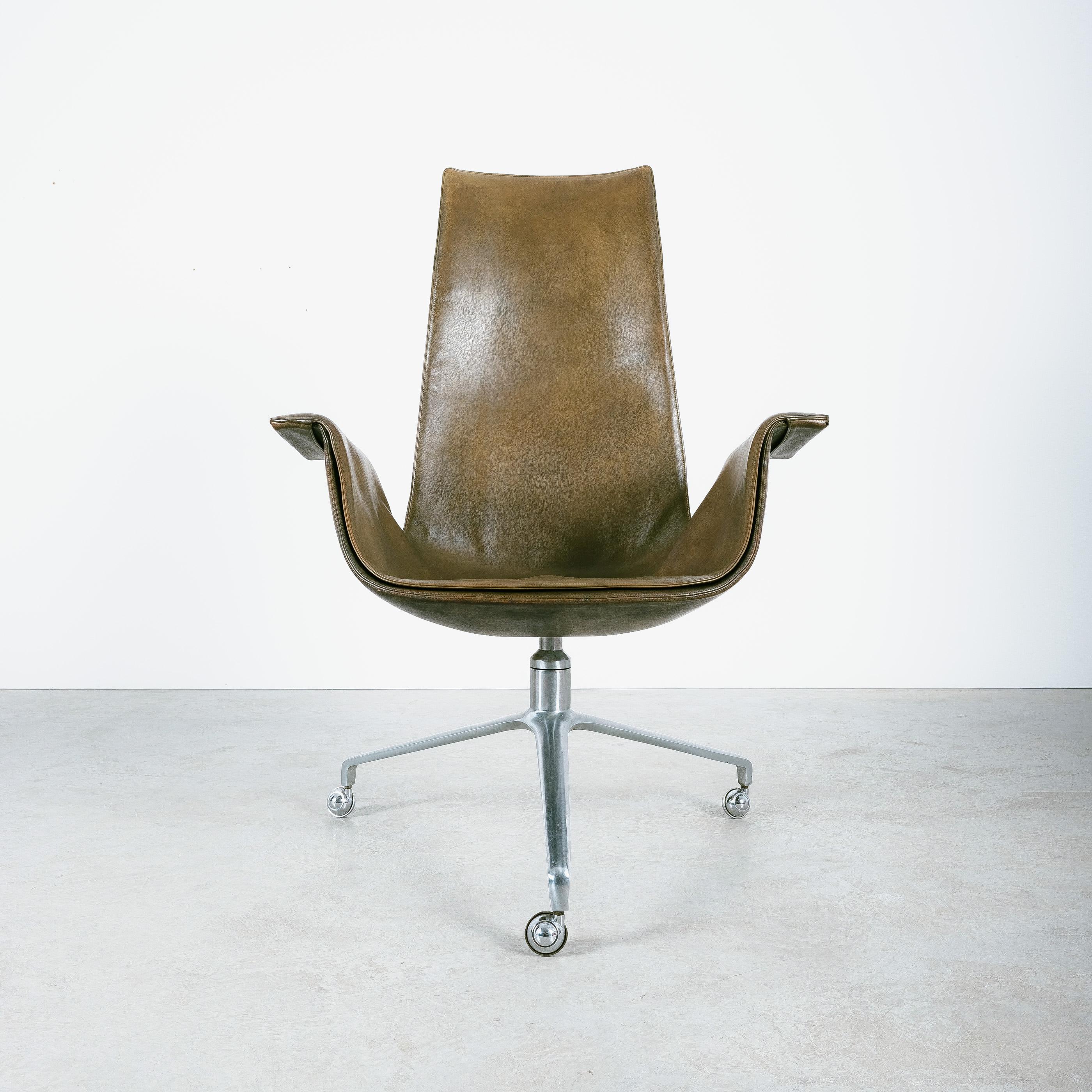 Original mid century dark green or khaki leather desk chair (seat height 17.23