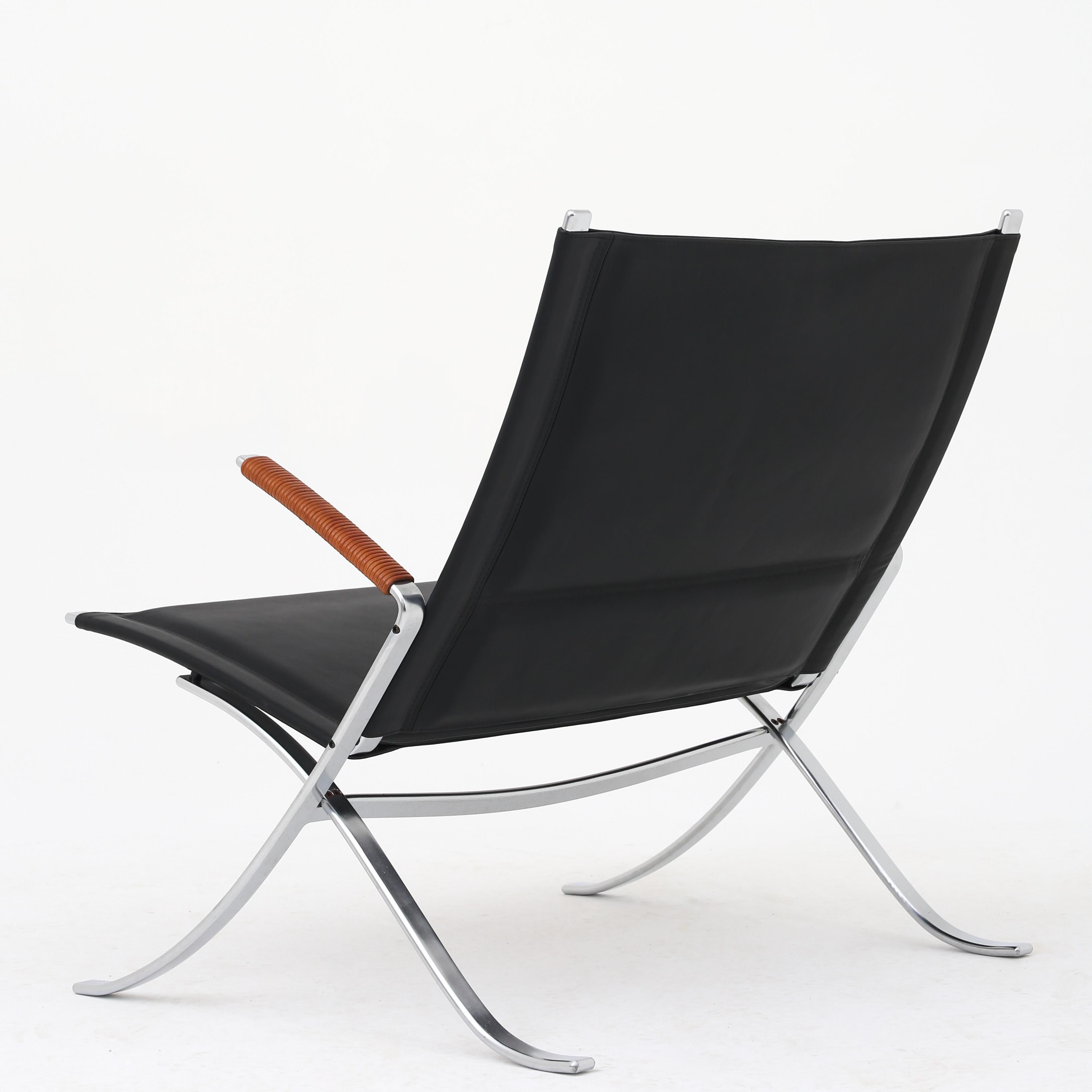Preben Fabricius & Jørgen Kastholm FK 82 - 'X Chair' easy chair in black leather, chrome-plated steel and wrapped natural leather. Maker Lange Production.