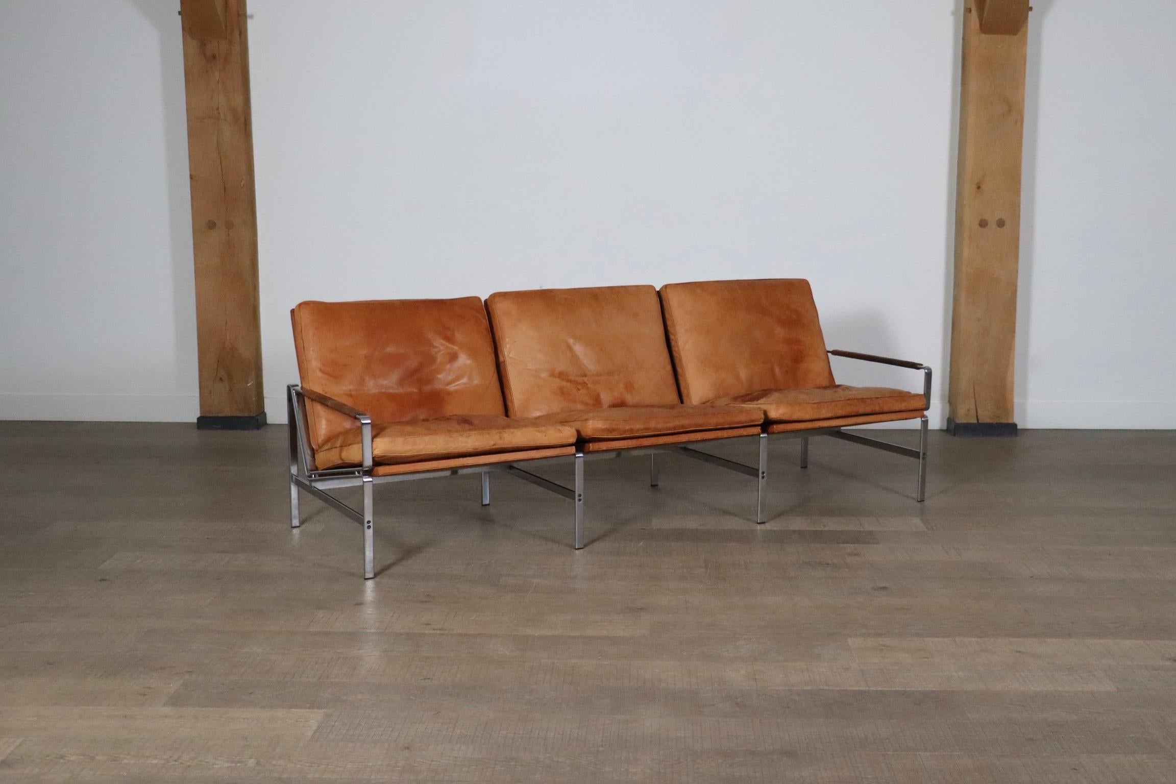 Fantastic FK6720 three seater sofa in cognac leather and chromed steel by Preben Fabricius and Jørgen Kastholm for Kill International, Germany 1960s. The minimalistic design features a nice flat chromed steel frame nicely curved corners and solid
