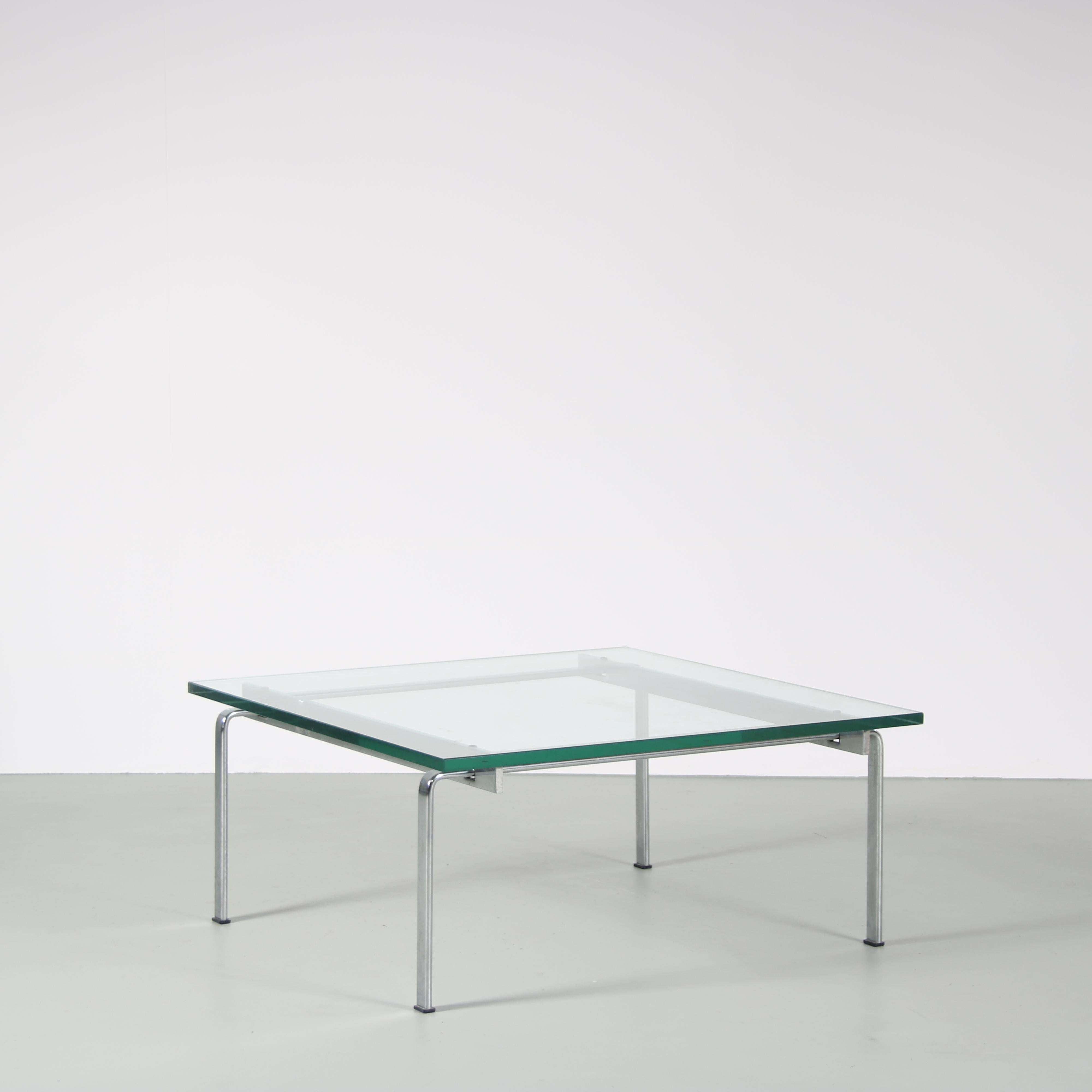 A beautiful coffee table, model FK90, designed by Preben Fabricius & Jorgen Kastholm, manufactured by Kill International in Germany around 1960.

This high quality piece features a chrome plated metal base with a thick, square glass top. The metal